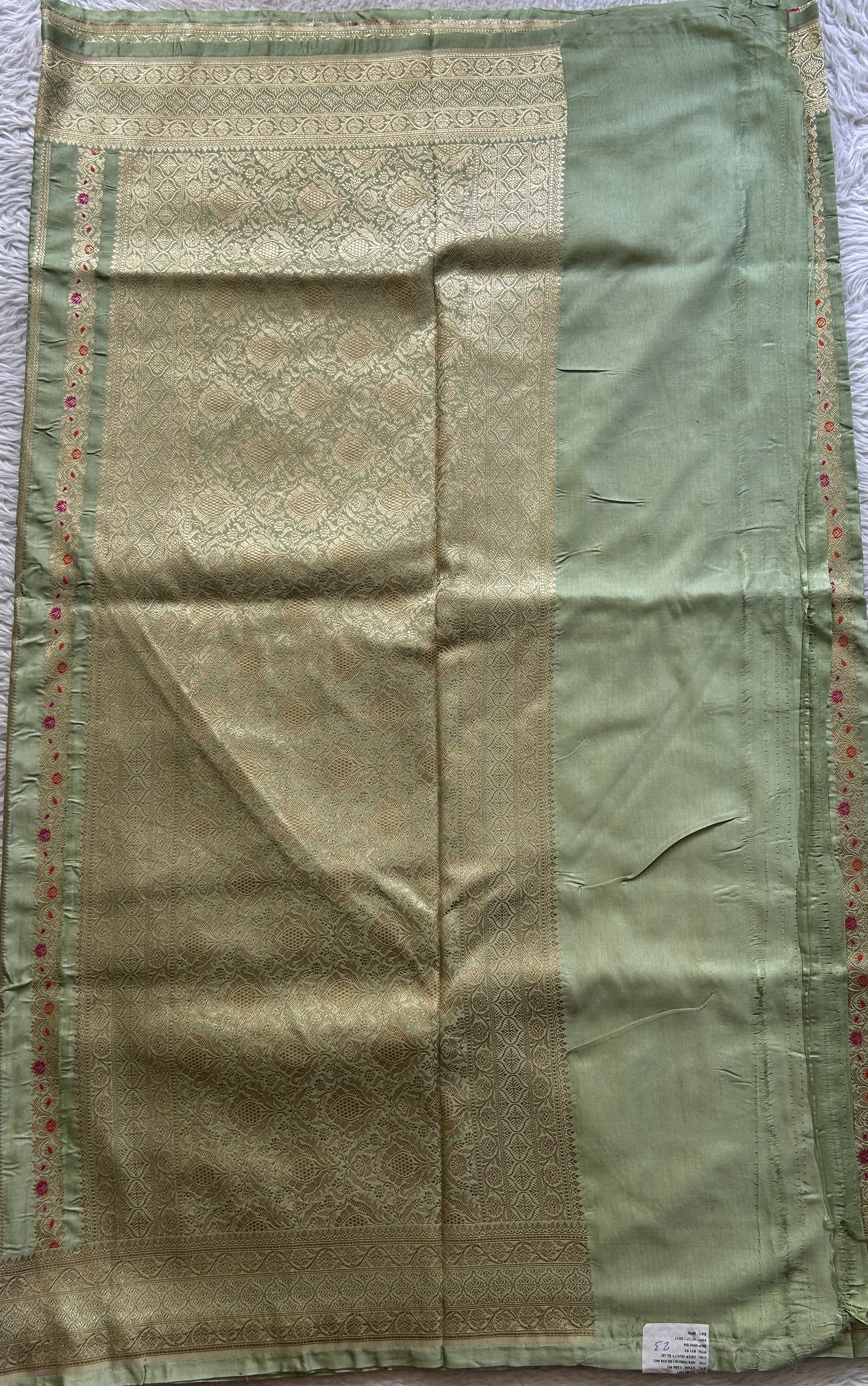 Chiniya Silk Saree Light Green Colored Elegantly Paired with a Zari Border. - Sampradaya Designer Studio