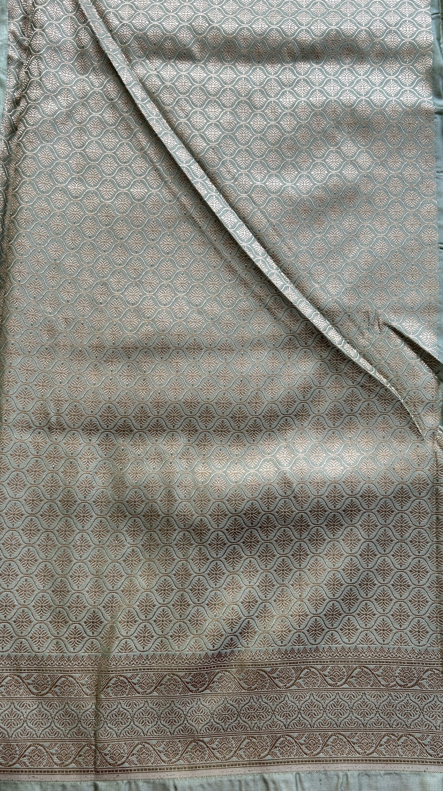 Chiniya Silk Saree Light Green Colored Elegantly Paired with a Zari Border. - Sampradaya Designer Studio