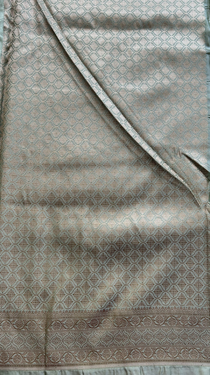 Chiniya Silk Saree Light Green Colored Elegantly Paired with a Zari Border. - Sampradaya Designer Studio