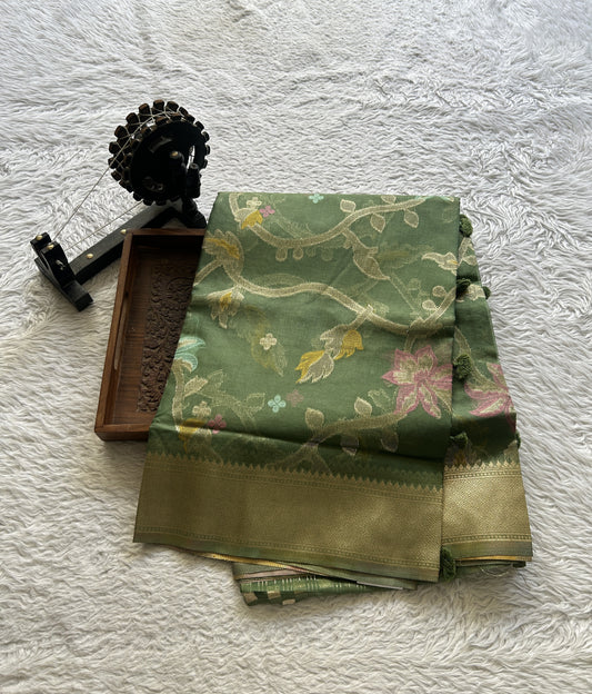 Semi Raw Silk Tissue Saree Olive Green Colored Elegantly Paired with a Zari Border. - Sampradaya Designer Studio