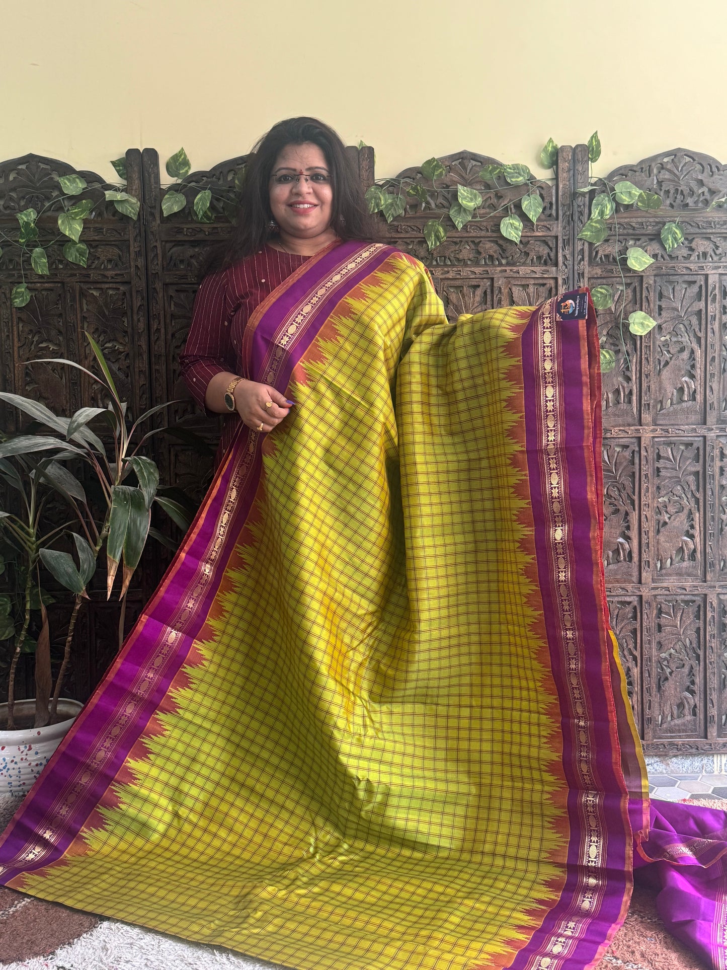 Gadwal Silk Saree Light Neon Green Colored Complemented With a Purple Zari Border - Sampradaya Designer Studio