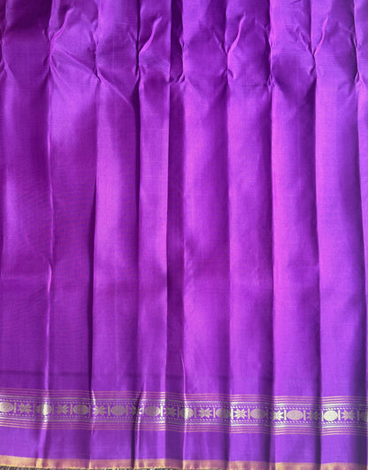 Gadwal Silk Saree Light Neon Green Colored Complemented With a Purple Zari Border - Sampradaya Designer Studio