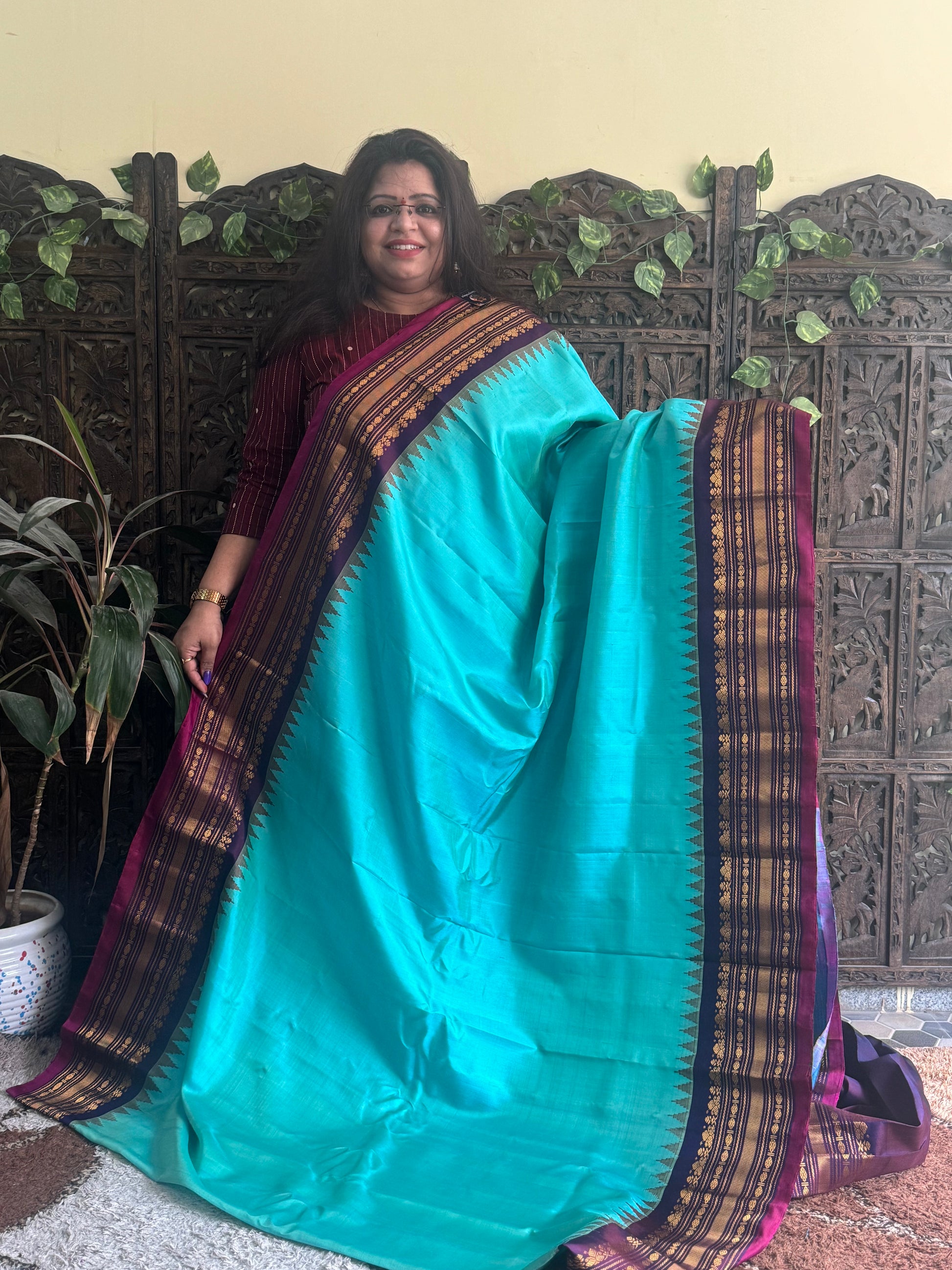 Gadwal Silk Saree Sea Blue Colored Complemented With a Dark Purple Zari Border - Sampradaya Designer Studio