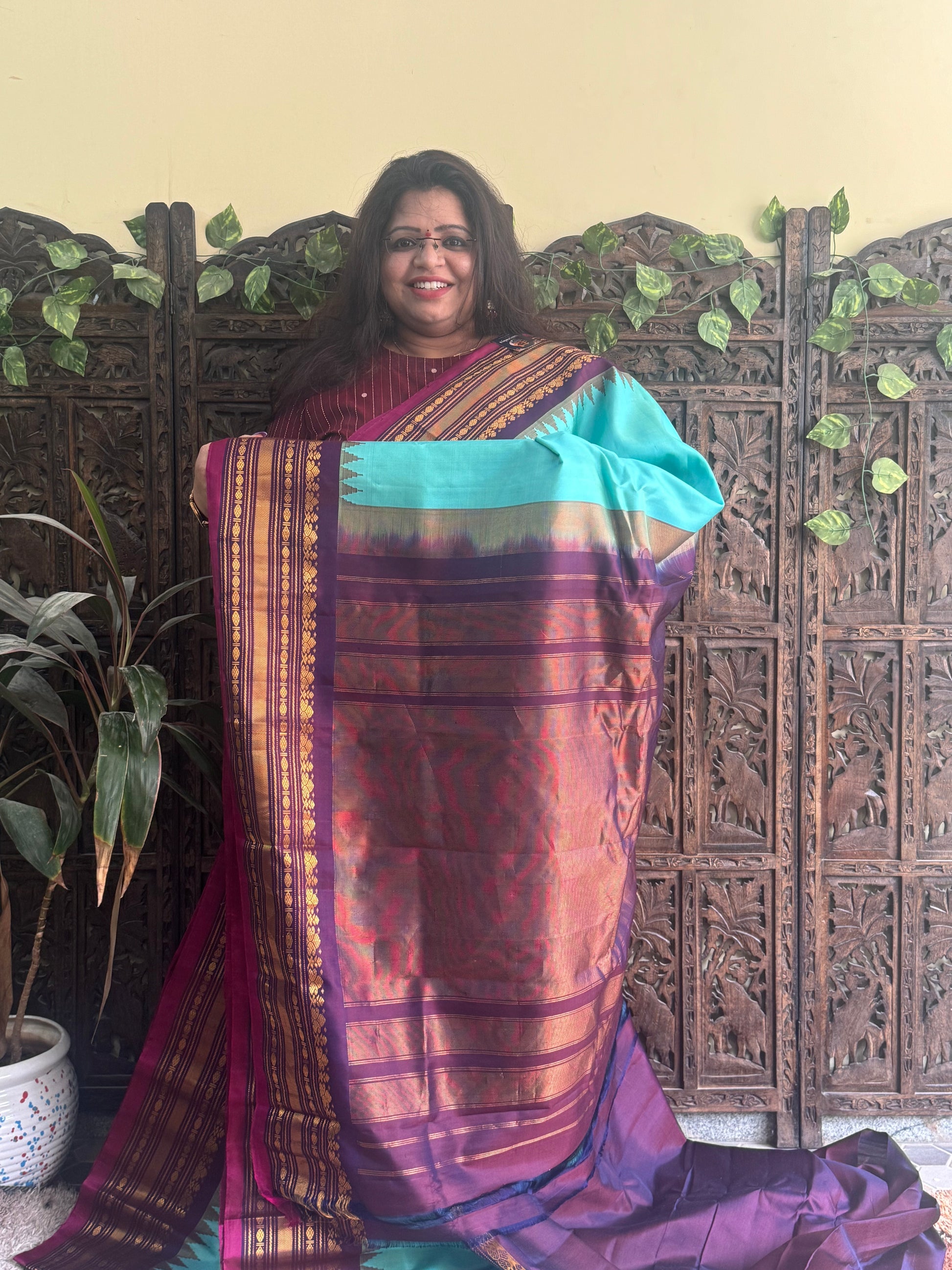 Gadwal Silk Saree Sea Blue Colored Complemented With a Dark Purple Zari Border - Sampradaya Designer Studio