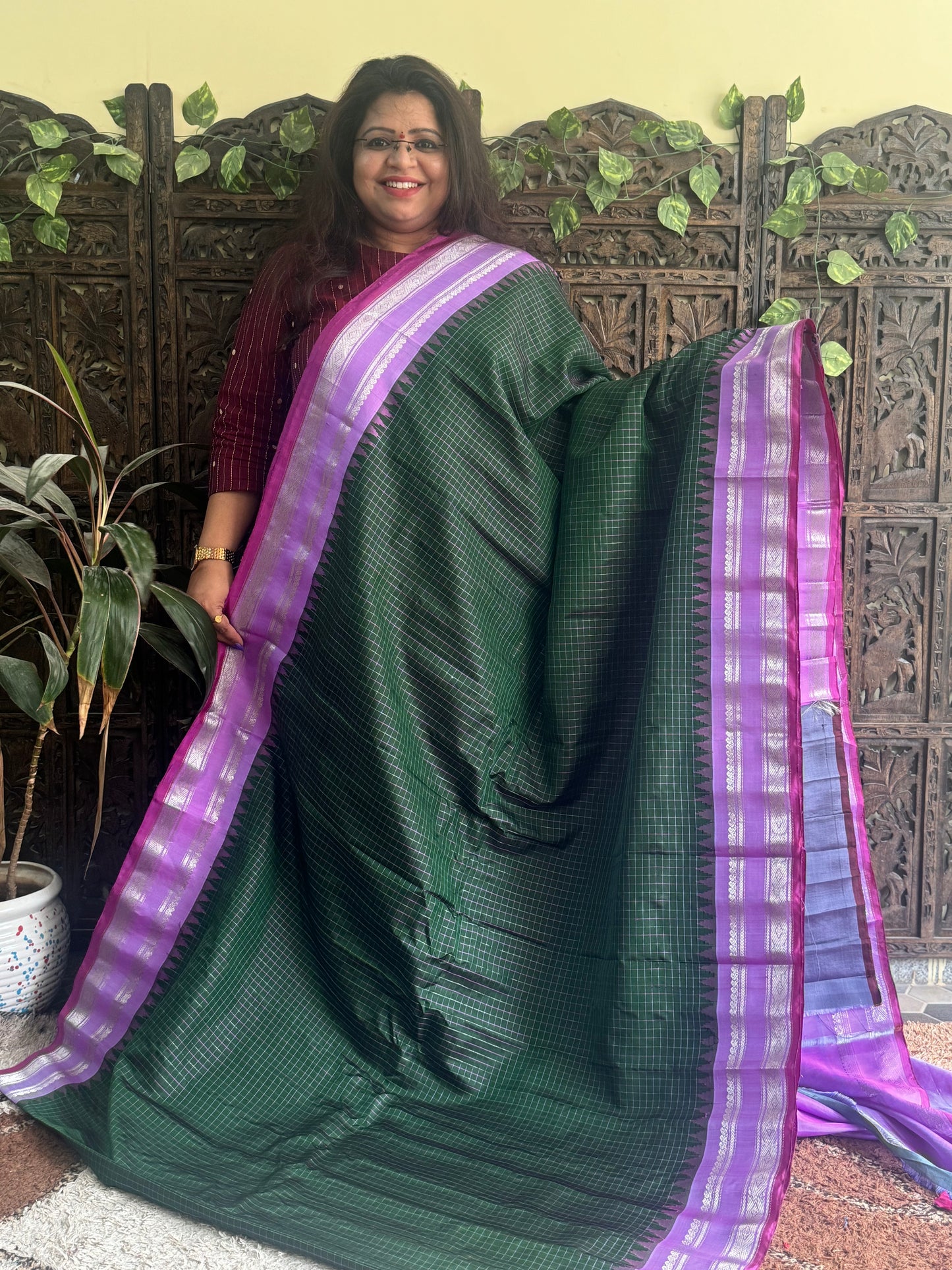 Gadwal Silk Saree Bottle Green Colored Complemented With a Lilac Zari Border - Sampradaya Designer Studio