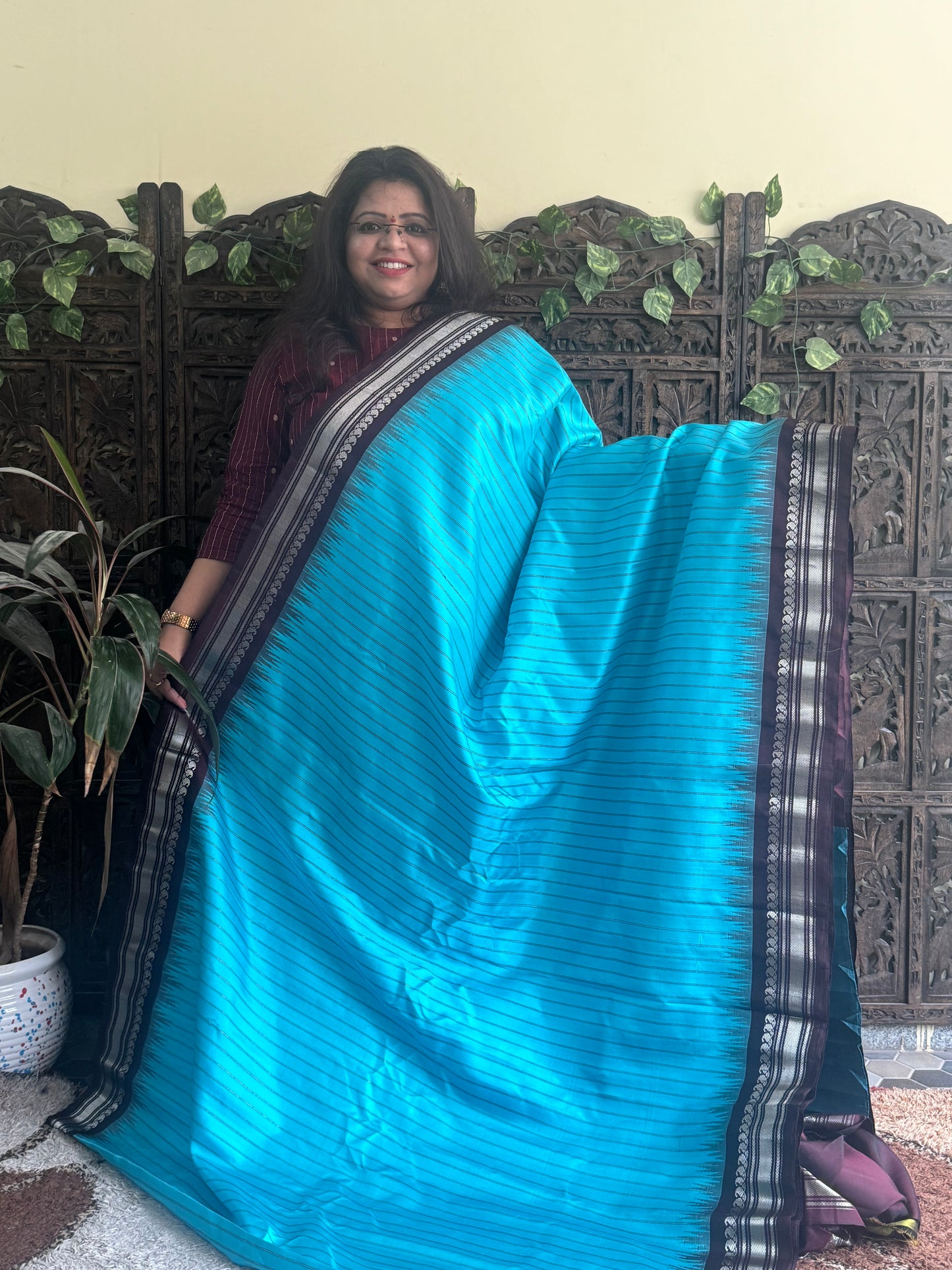 Gadwal Silk Saree Sky Blue Colored Complemented With a Brown Zari Border - Sampradaya Designer Studio