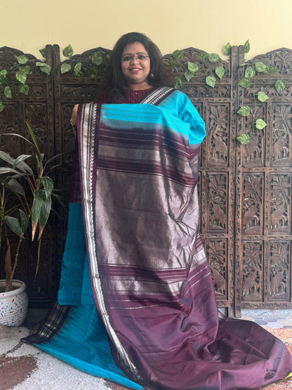 Gadwal Silk Saree Sky Blue Colored Complemented With a Brown Zari Border - Sampradaya Designer Studio