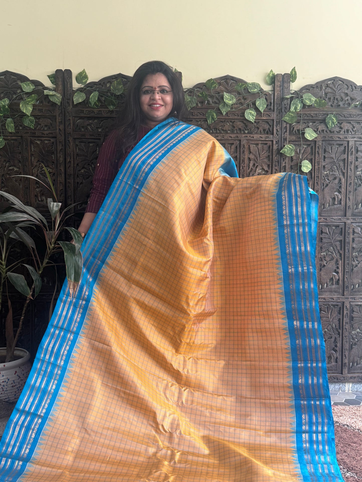 Gadwal Silk Saree Macaroon Colored Complemented With a Blue Zari Border - Sampradaya Designer Studio