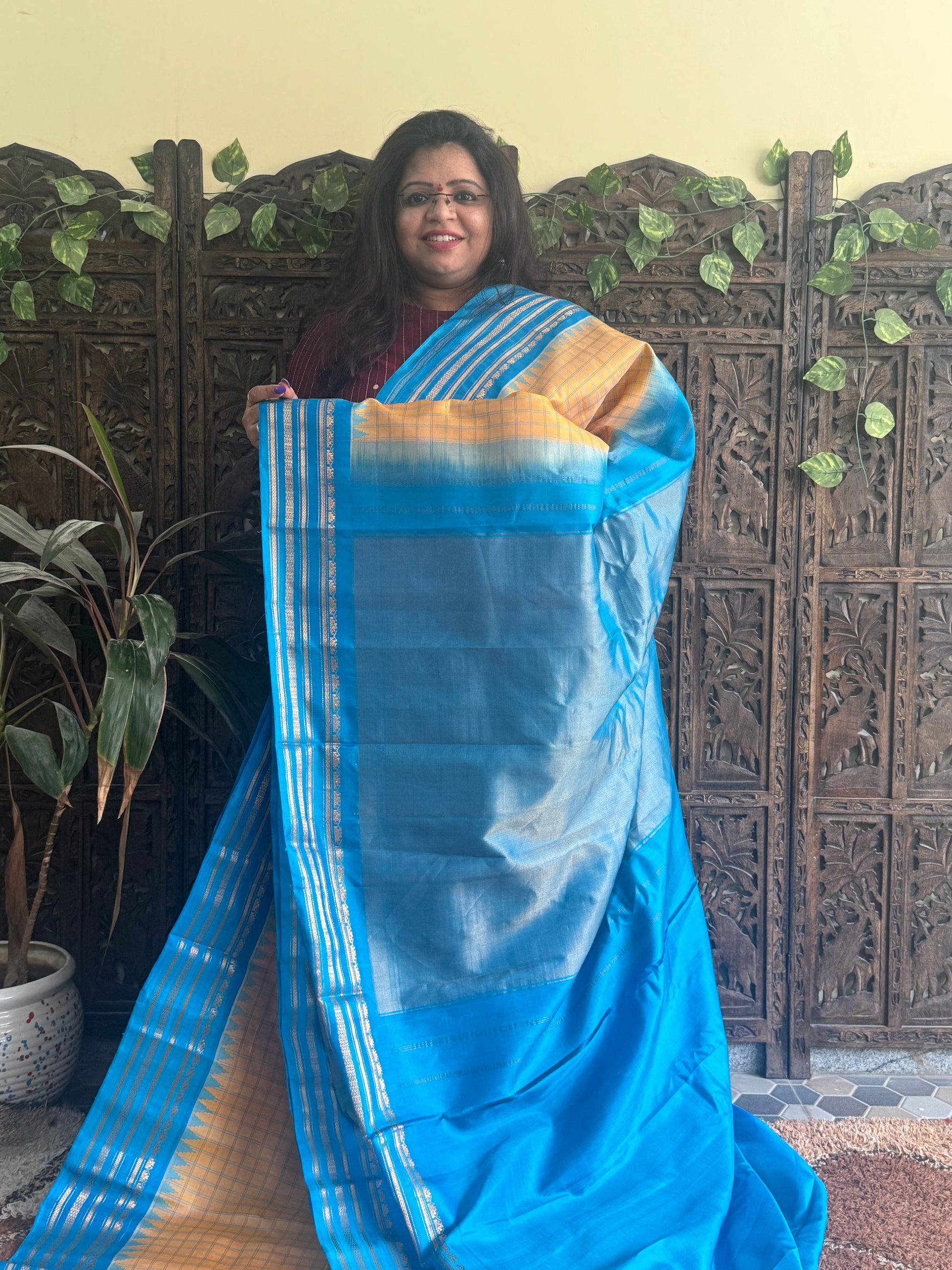 Gadwal Silk Saree Macaroon Colored Complemented With a Blue Zari Border - Sampradaya Designer Studio