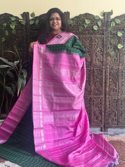 Gadwal Silk Saree Bottle Green Colored Complemented With a Pink Zari Border - Sampradaya Designer Studio