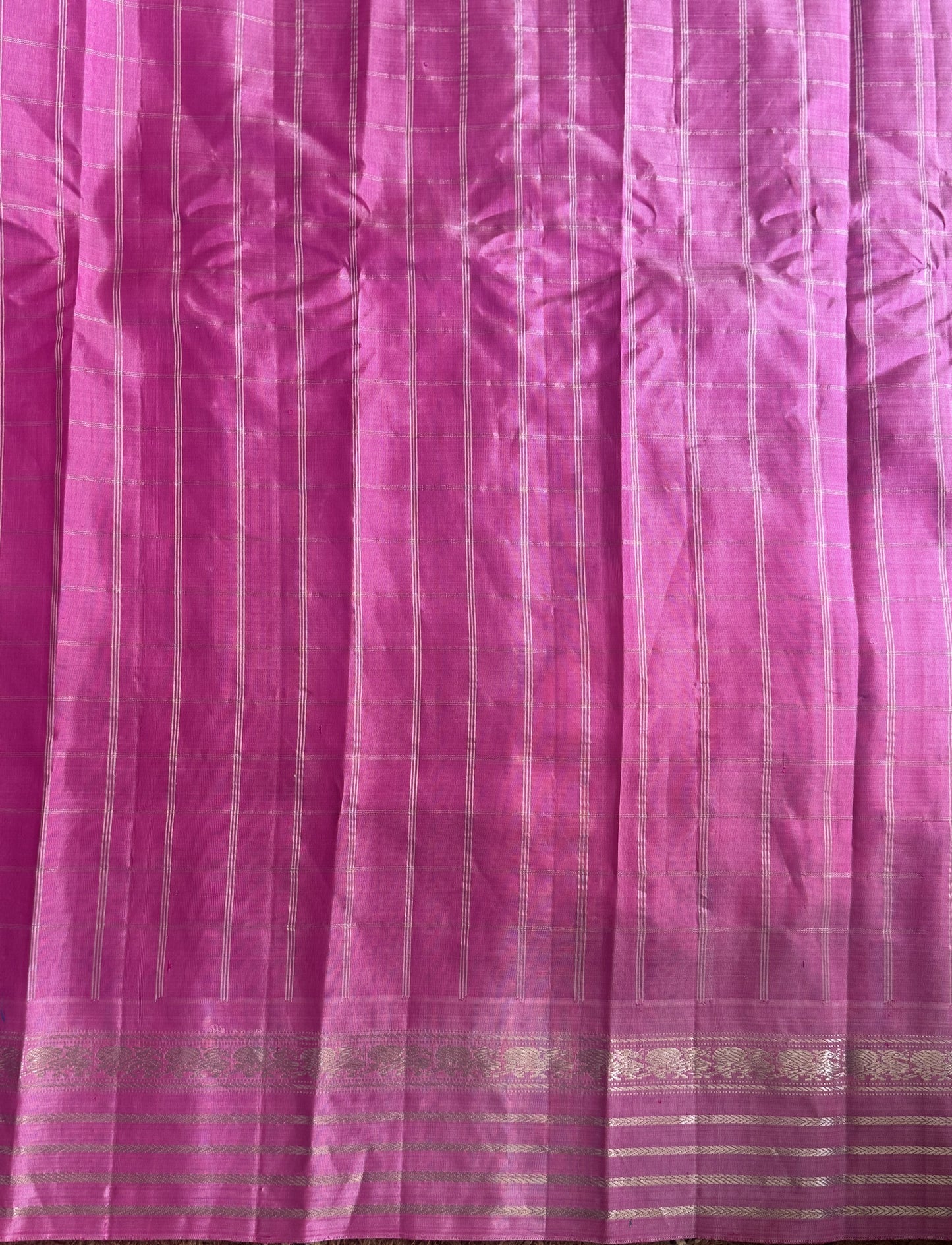 Gadwal Silk Saree Bottle Green Colored Complemented With a Pink Zari Border - Sampradaya Designer Studio