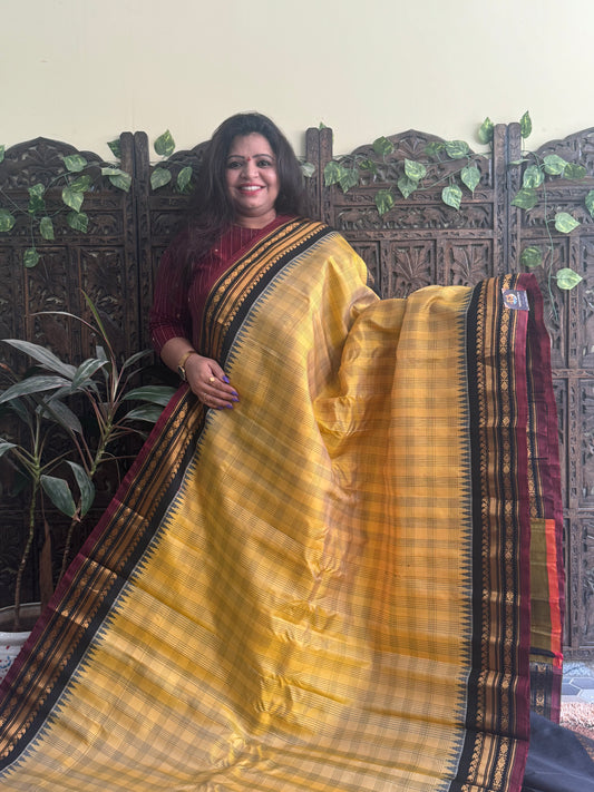 Gadwal Silk Saree Sand Colored Complemented With a Black Zari Border - Sampradaya Designer Studio