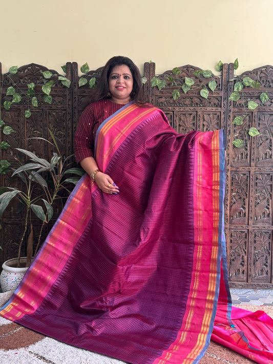 Gadwal Silk Saree Grape Colored Complemented With a Pink Zari Gap Border - Sampradaya Designer Studio