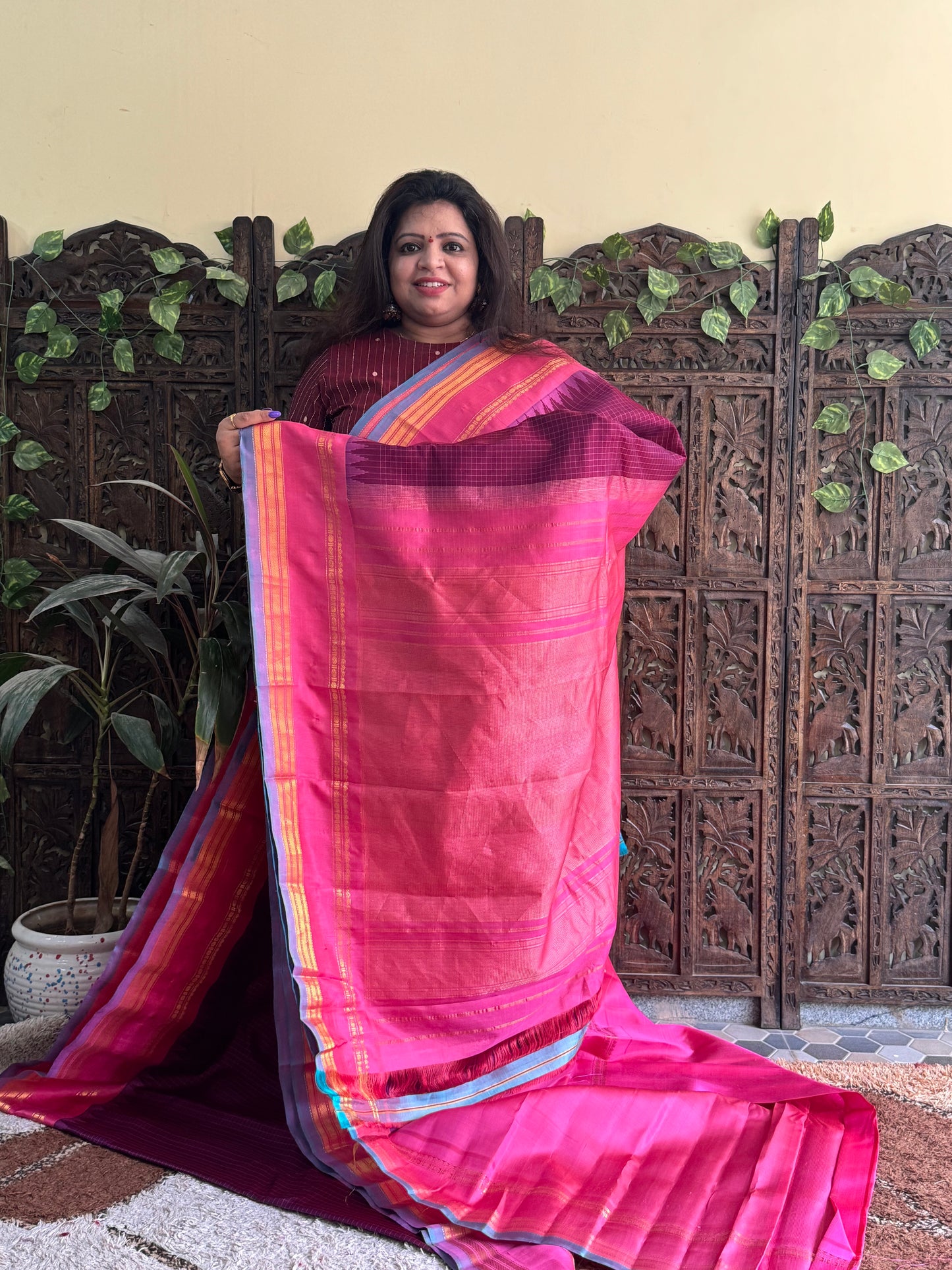 Gadwal Silk Saree Grape Colored Complemented With a Pink Zari Gap Border - Sampradaya Designer Studio