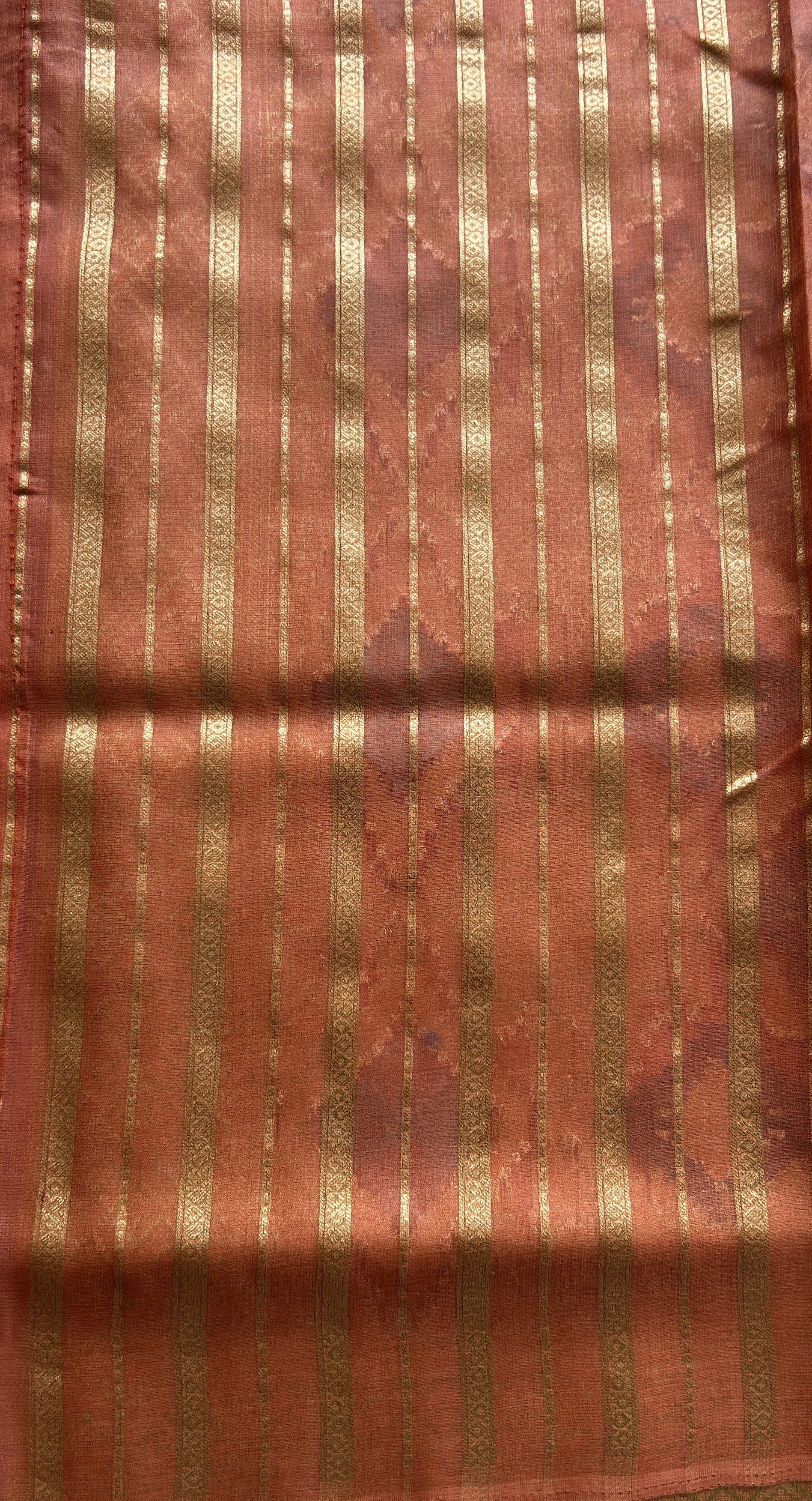 Semi Raw Silk Tissue Saree Dark Peach Colored Elegantly Paired with a Zari Border. - Sampradaya Designer Studio