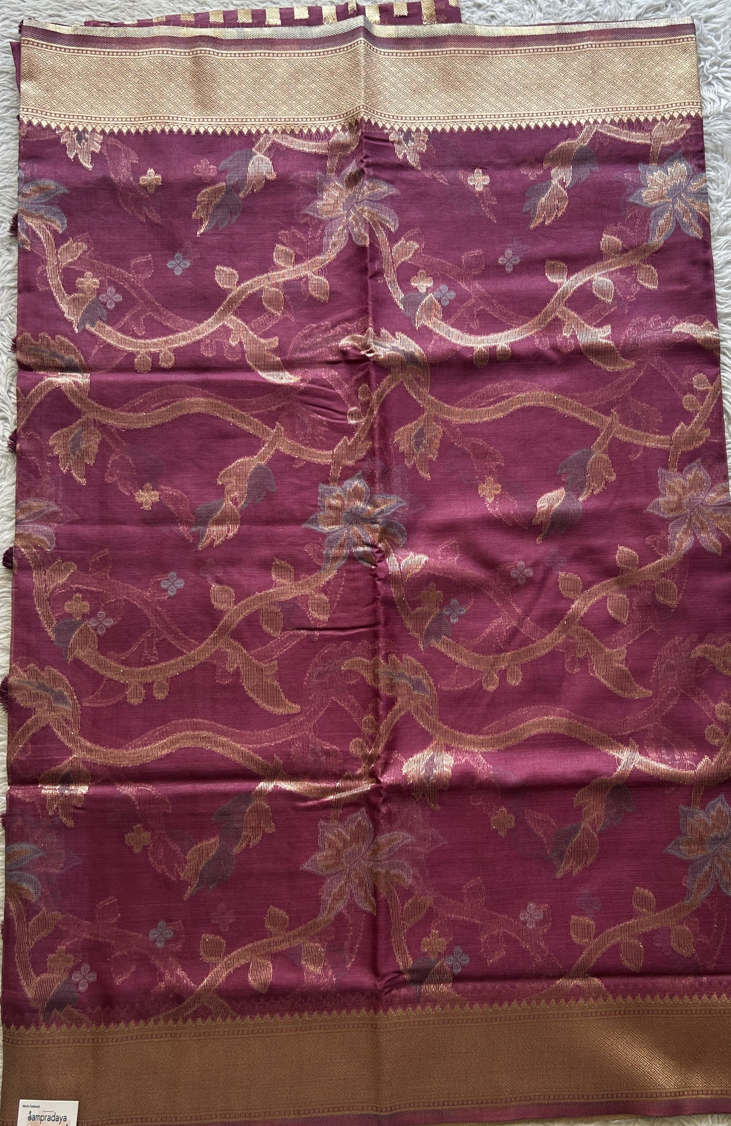 Semi Raw Silk Tissue Saree Magenta Colored Elegantly Paired with a Zari Border. - Sampradaya Designer Studio