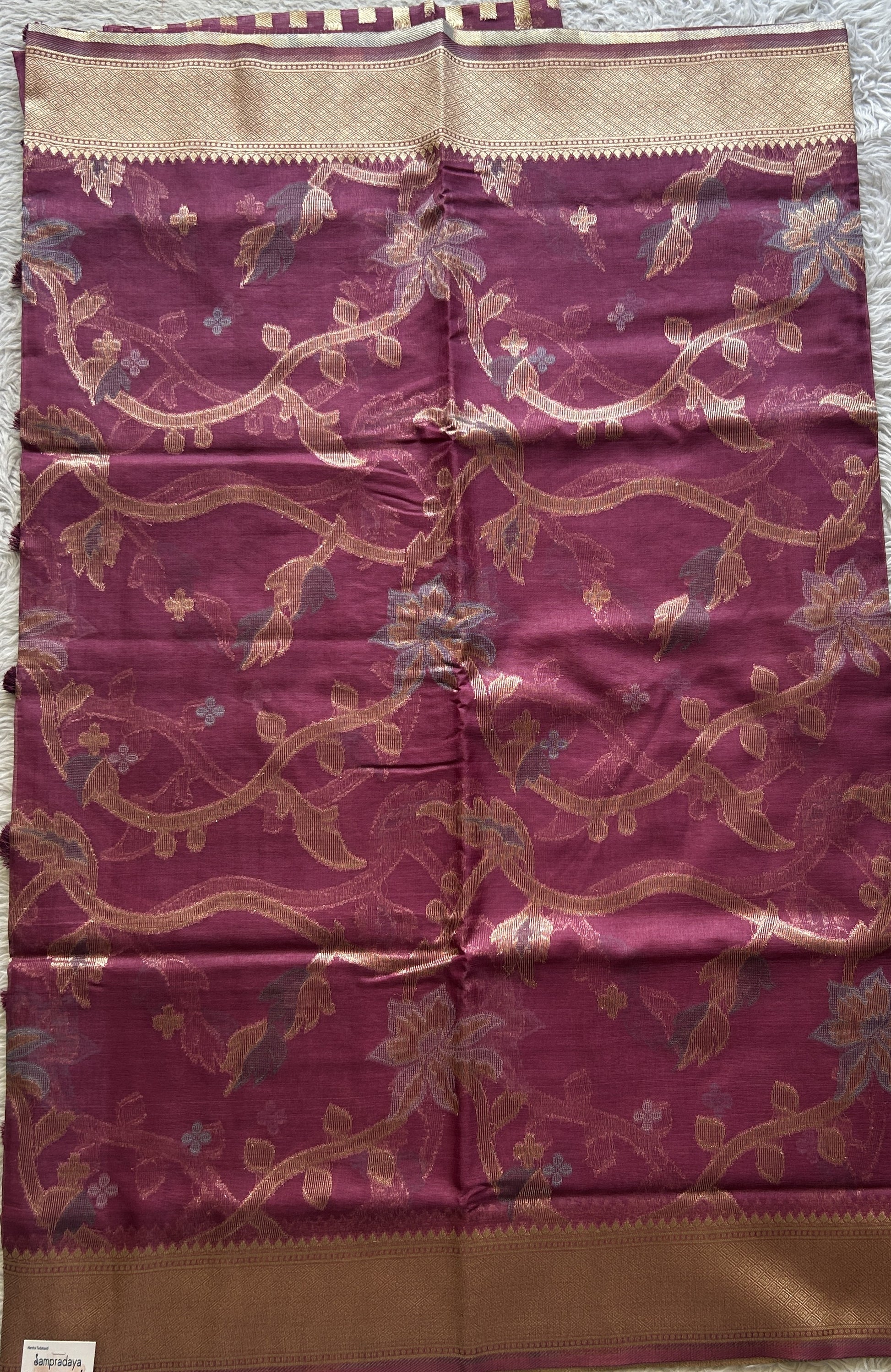 Semi Raw Silk Tissue Saree Magenta Colored Elegantly Paired with a Zari Border. - Sampradaya Designer Studio