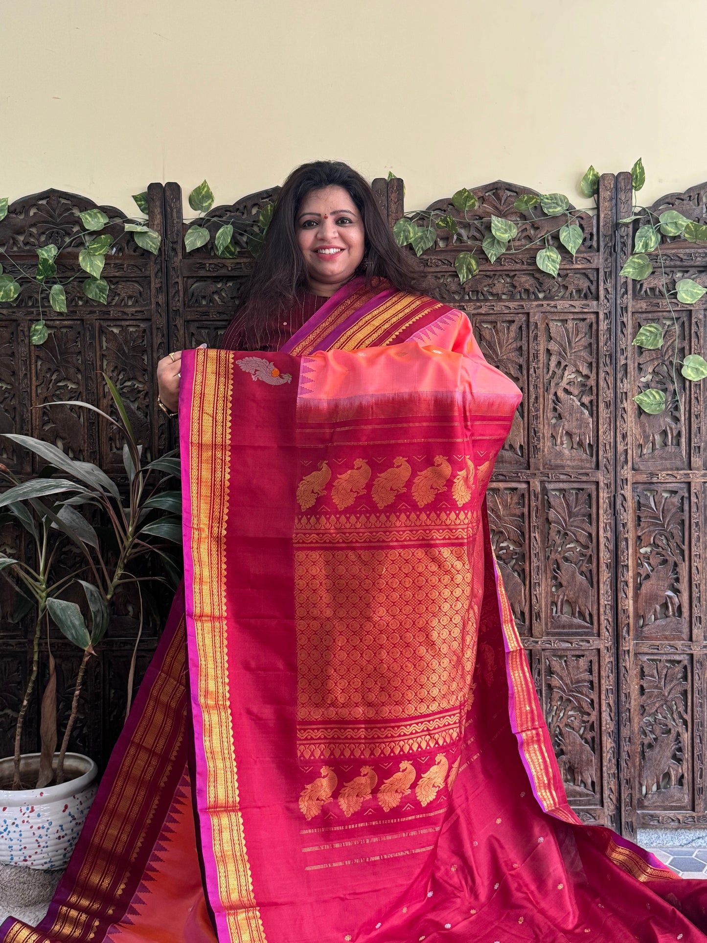 Gadwal Silk Saree Peach Colored Complemented With a Maroon Zari Border - Sampradaya Designer Studio