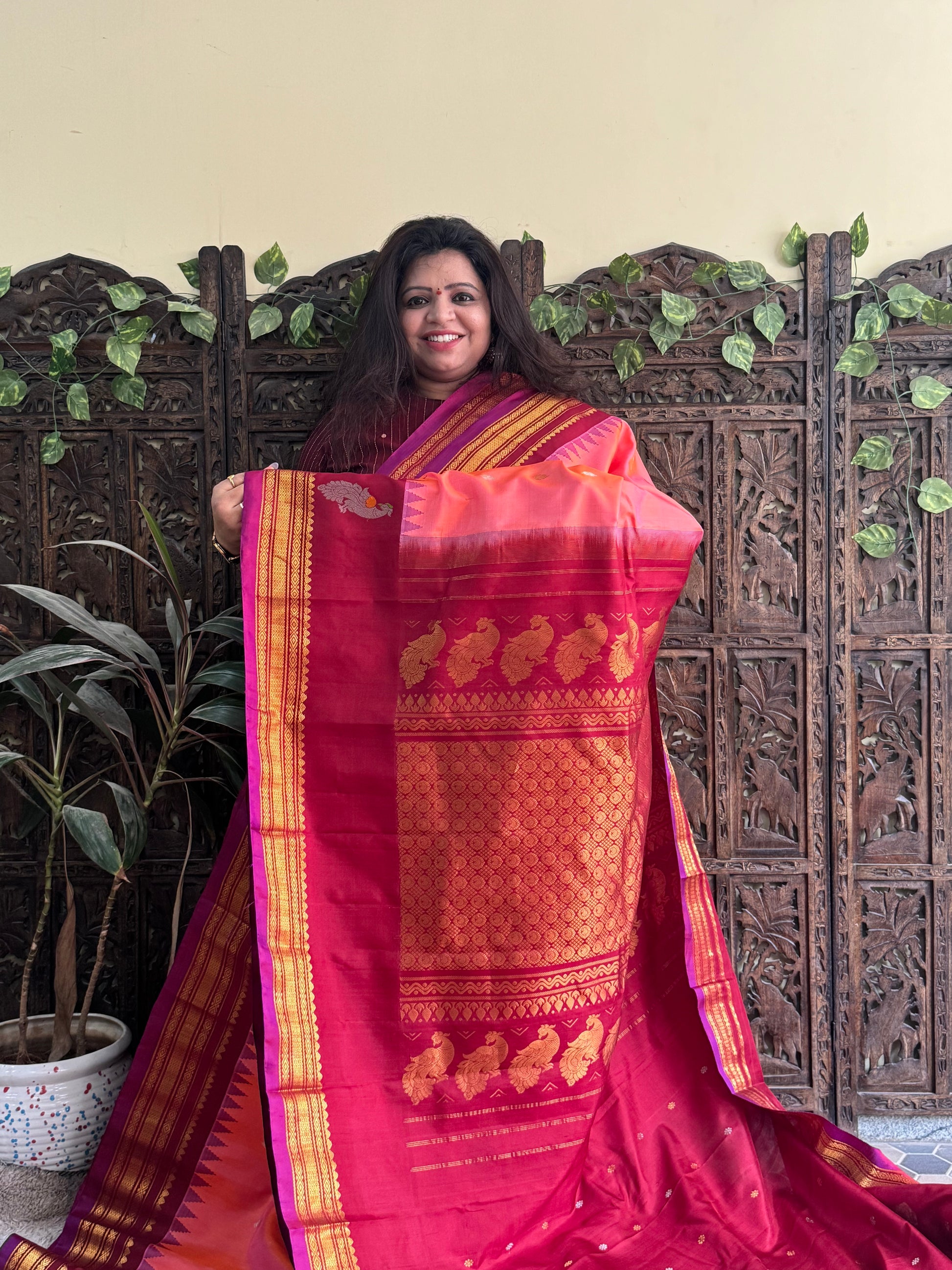 Gadwal Silk Saree Peach Colored Complemented With a Maroon Zari Border - Sampradaya Designer Studio