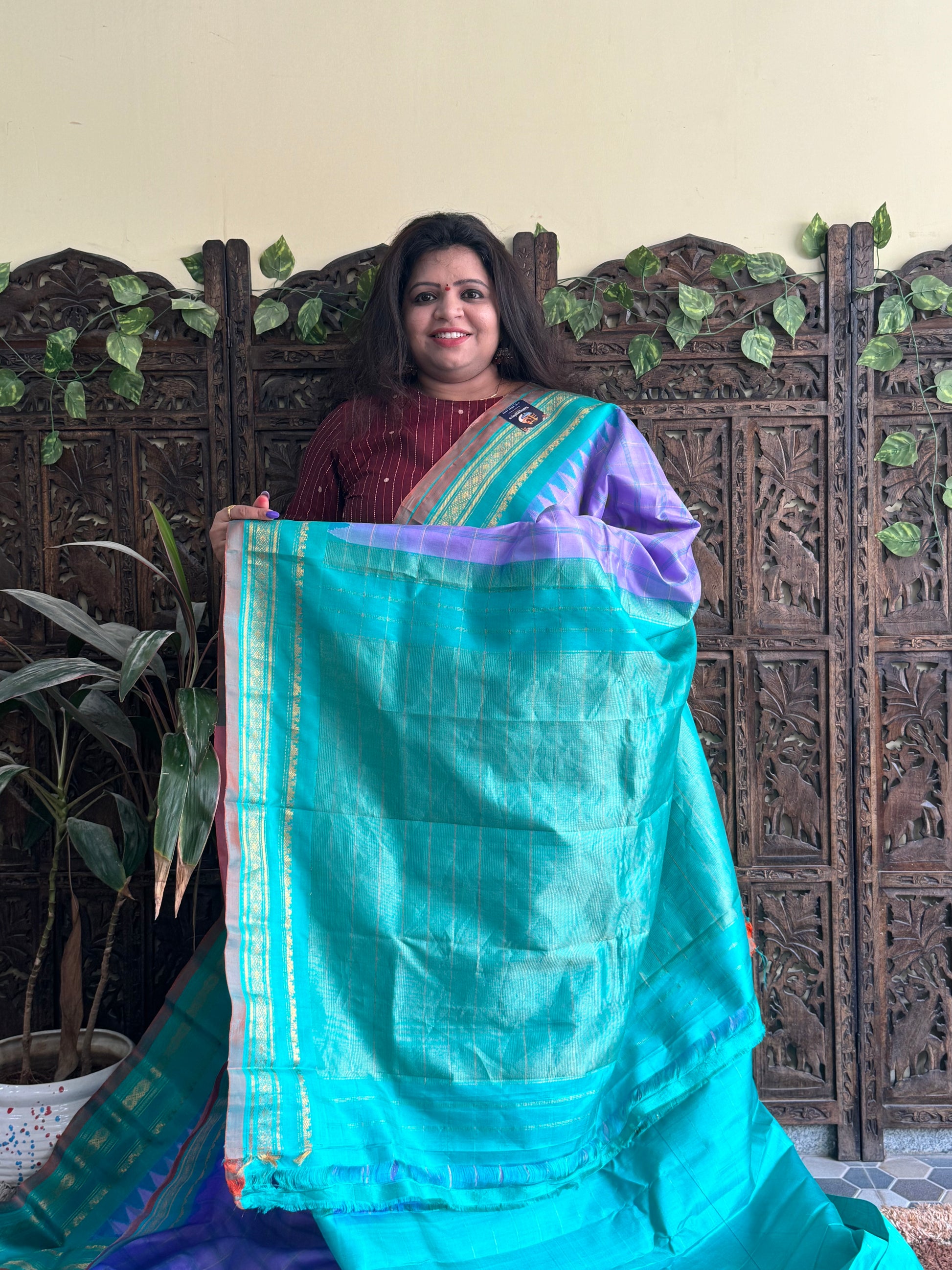 Gadwal Silk Saree Lilac Colored Complemented With a Sea Green Zari Border - Sampradaya Designer Studio