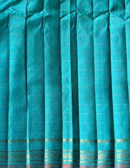 Gadwal Silk Saree Lilac Colored Complemented With a Sea Green Zari Border - Sampradaya Designer Studio