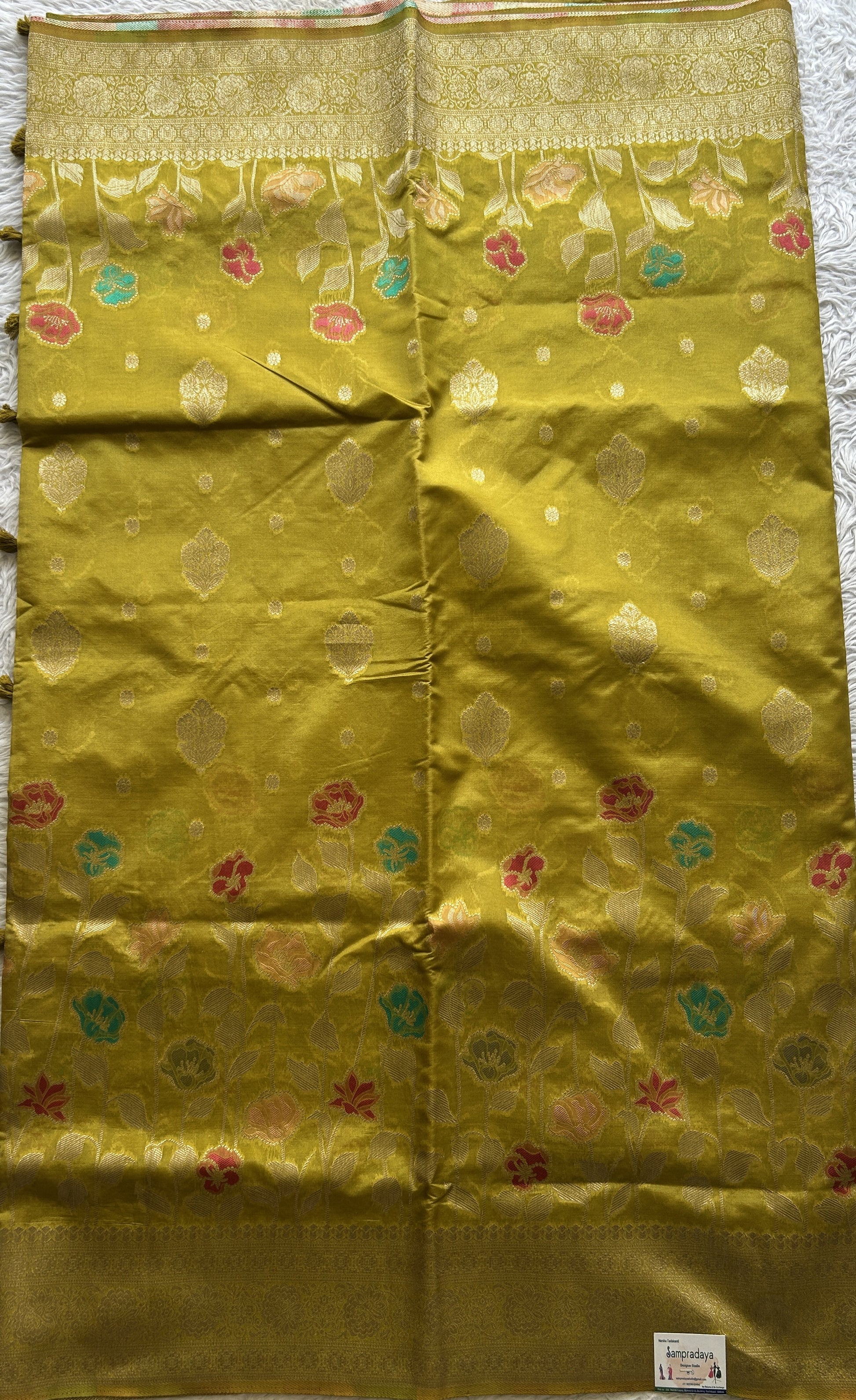 Semi Raw Silk Saree Mustard Green Colored Elegantly Paired with a Zari Border. - Sampradaya Designer Studio