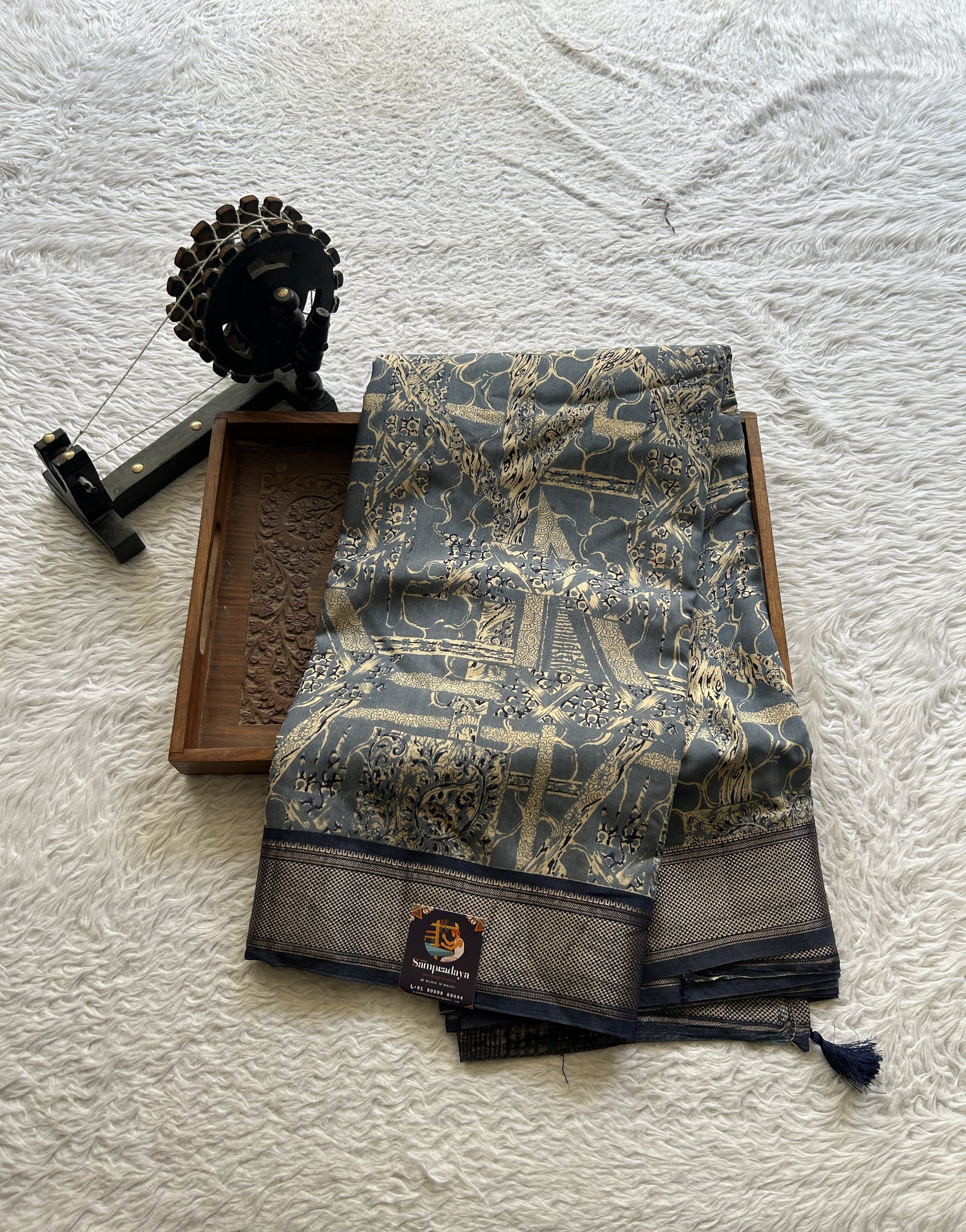 Dola Crepe Saree Indigo Blue Colored Elegantly Paired with a Zari Border. - Sampradaya Designer Studio