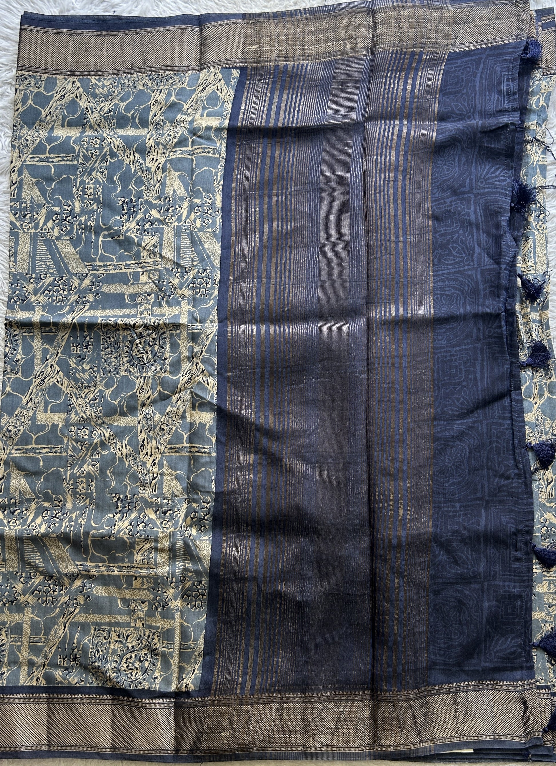 Dola Crepe Saree Indigo Blue Colored Elegantly Paired with a Zari Border. - Sampradaya Designer Studio