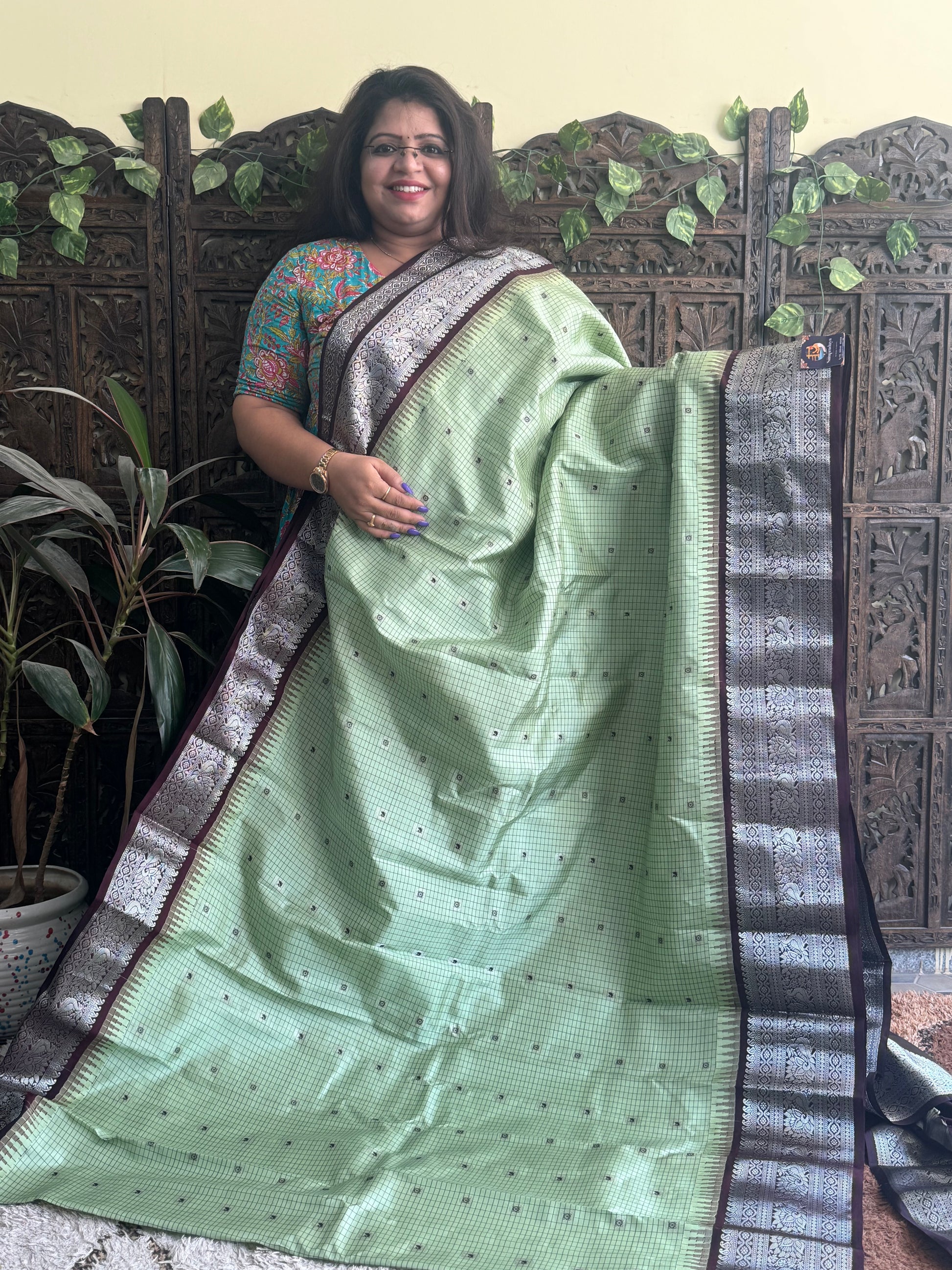 Gadwal Pattu Saree Green colored saree complemented with a Brown Zari border - Sampradaya Designer Studio