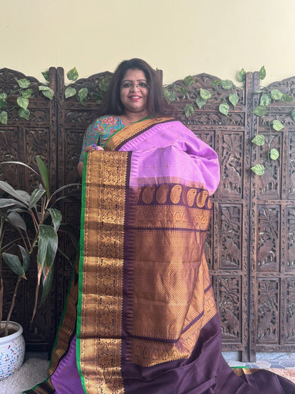 Gadwal Pattu Saree Lavender colored saree complemented with a Brown Zari border - Sampradaya Designer Studio