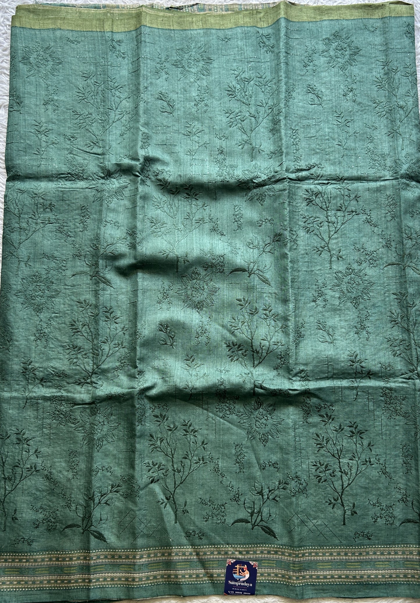 Pure Tussar Silk Saree Pine Green Color Complemented with a Printed Border. - Sampradaya Designer Studio