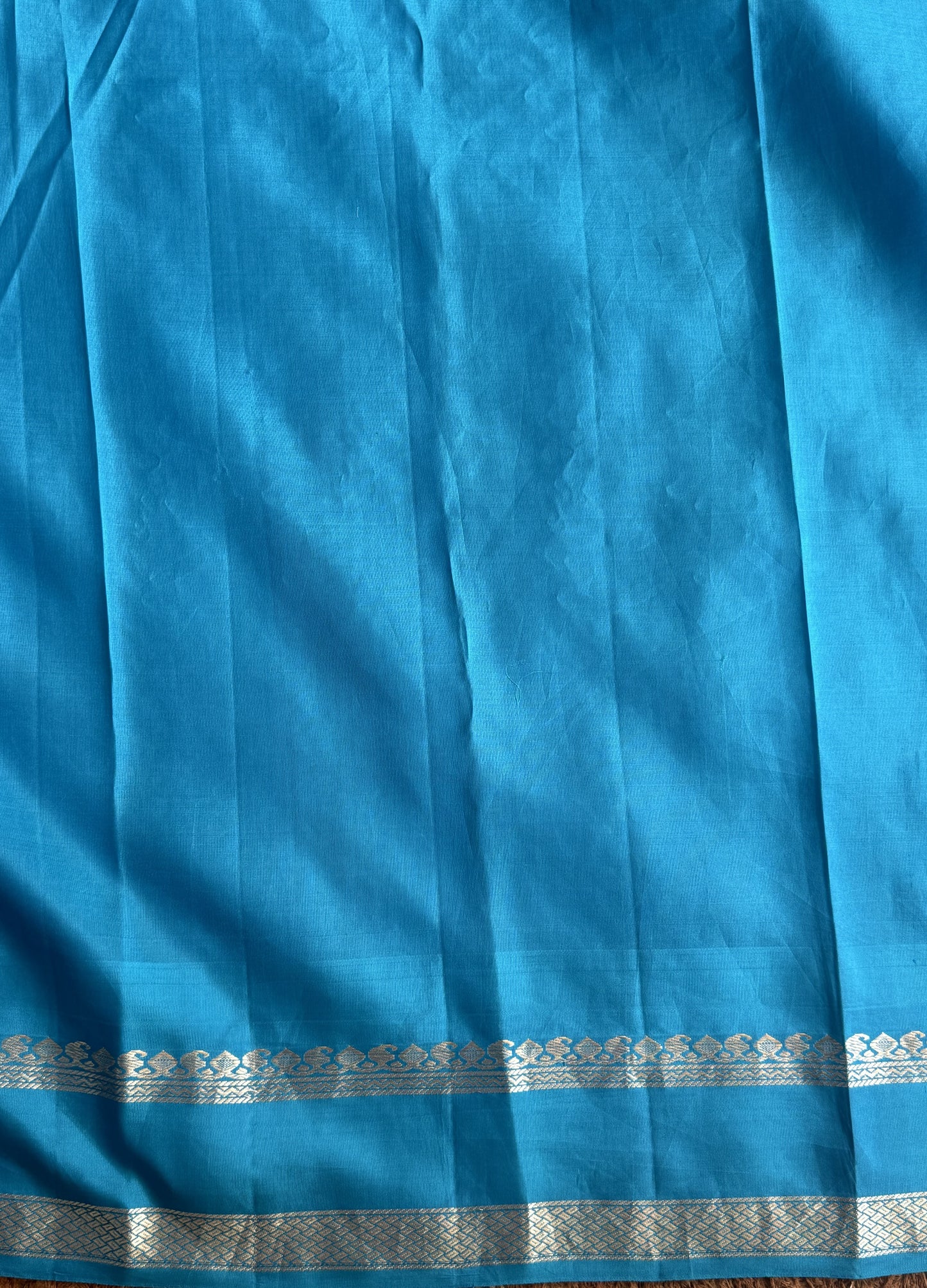 Gadwal Pattu Saree Red colored saree complemented with a Blue Zari border - Sampradaya Designer Studio