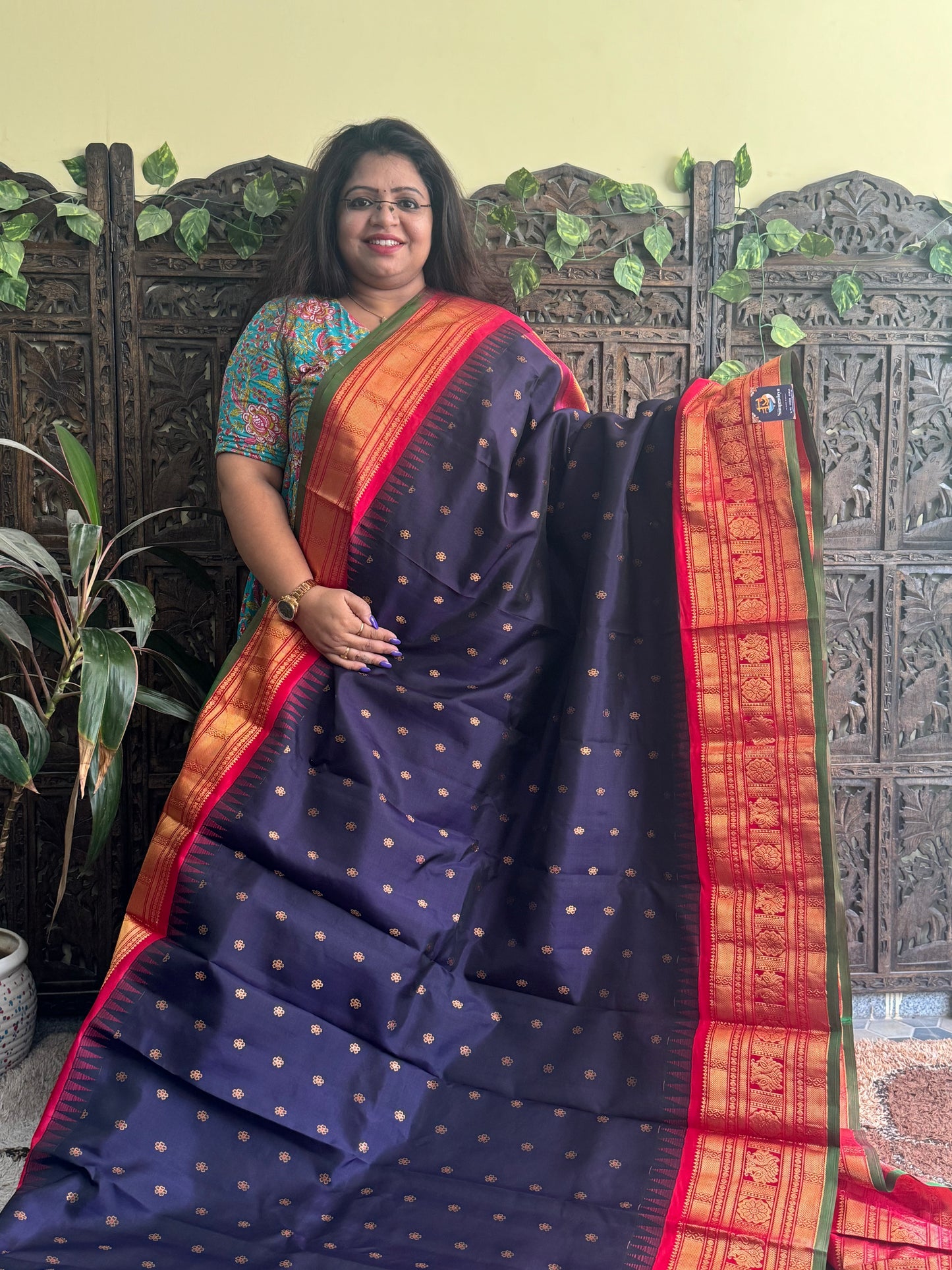 Gadwal Pattu Saree Dark Purple colored saree complemented with a Red Zari border - Sampradaya Designer Studio