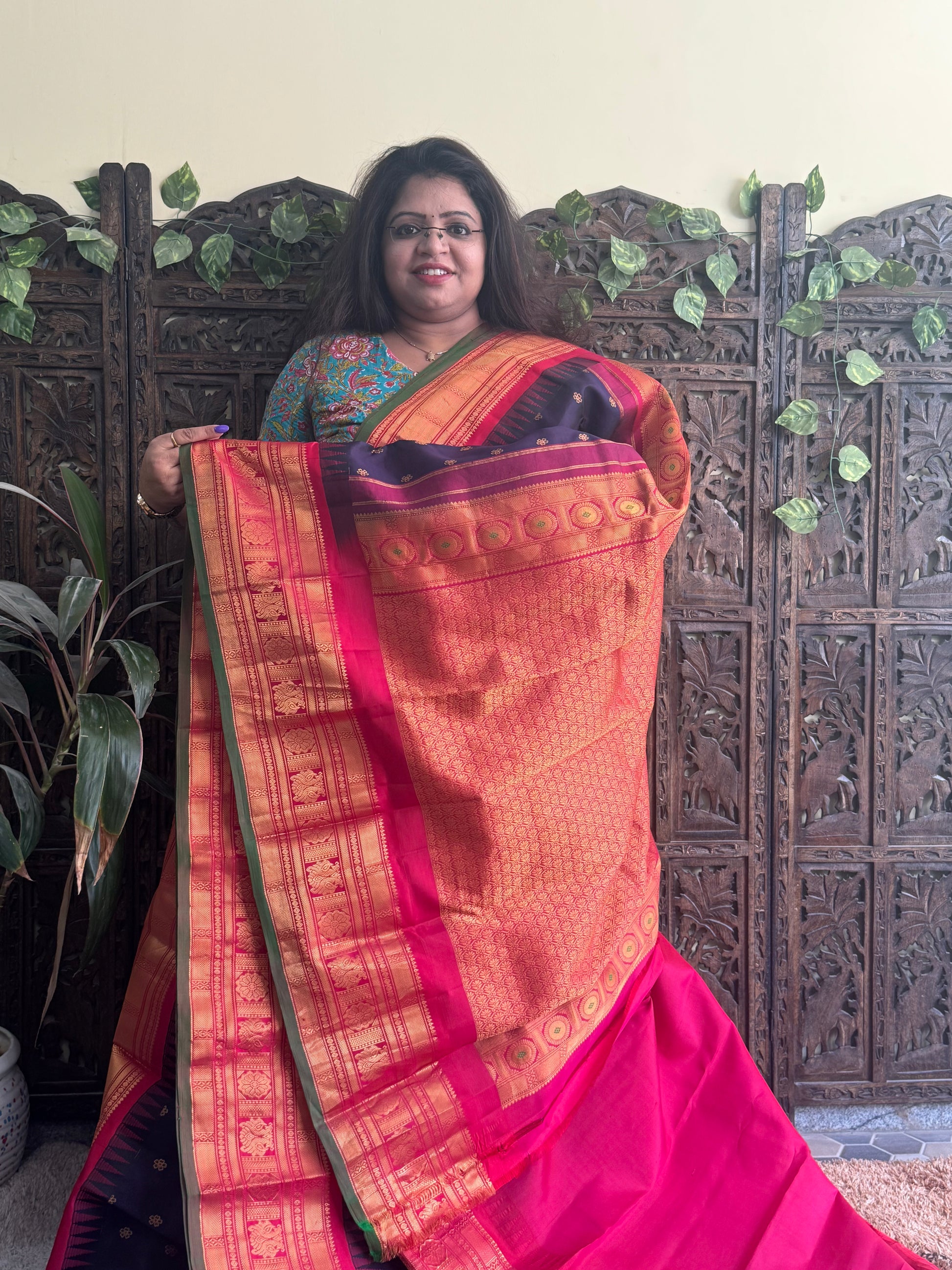 Gadwal Pattu Saree Dark Purple colored saree complemented with a Red Zari border - Sampradaya Designer Studio