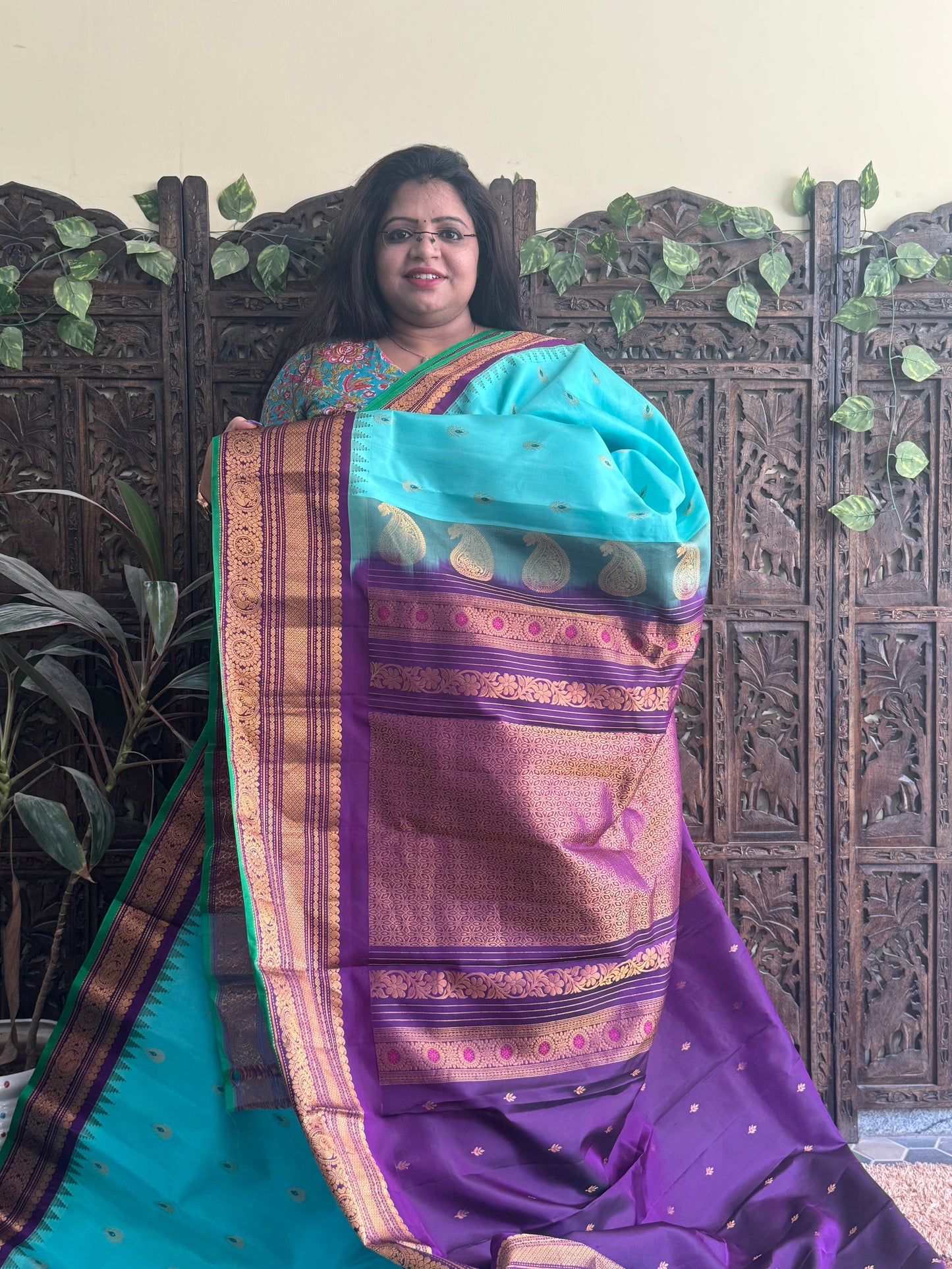 Gadwal Pattu Saree Sea Blue colored saree complemented with a Purple Zari border - Sampradaya Designer Studio