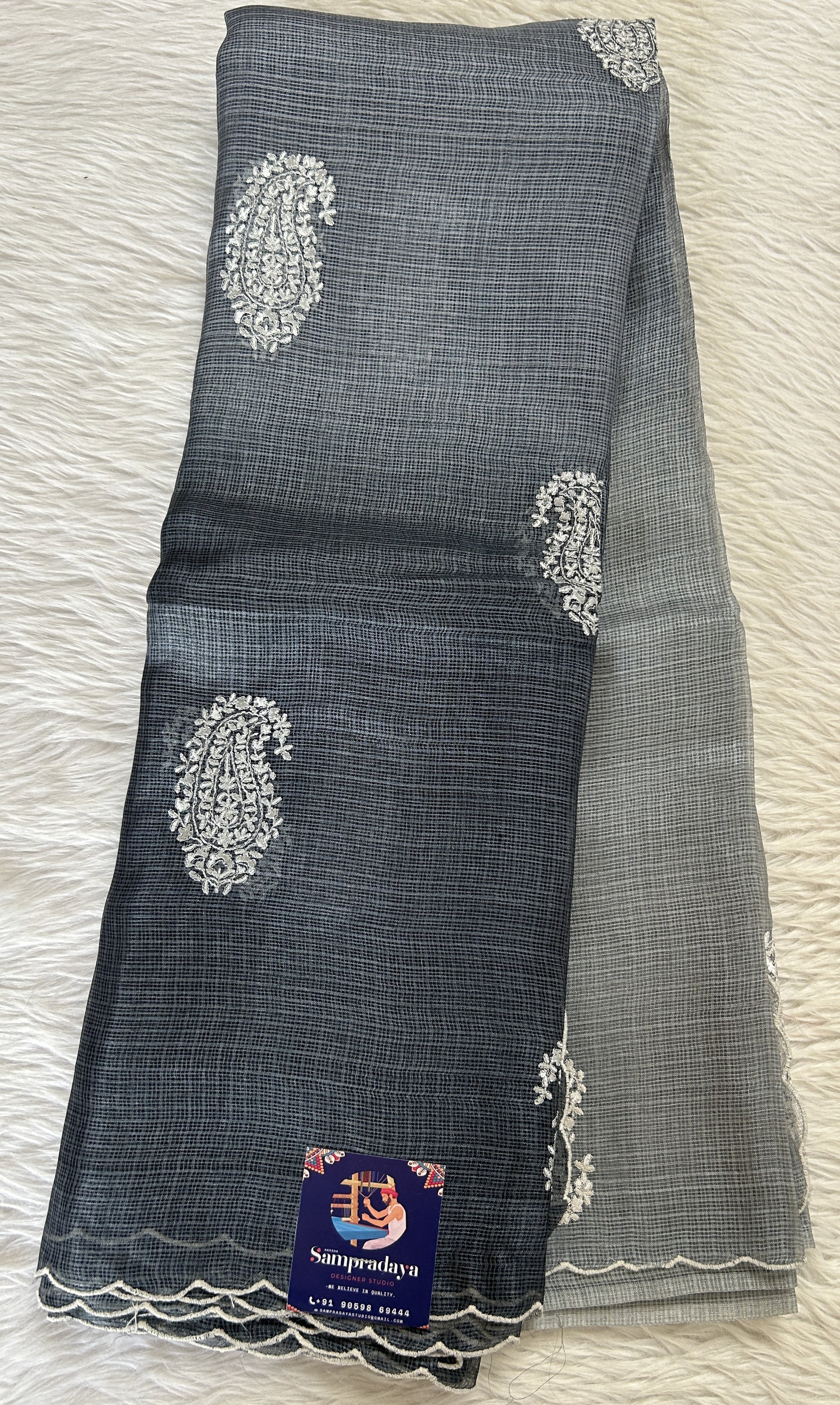 Tussar Silk Saree Gray colored complemented with a borderless Saree. - Sampradaya Designer Studio