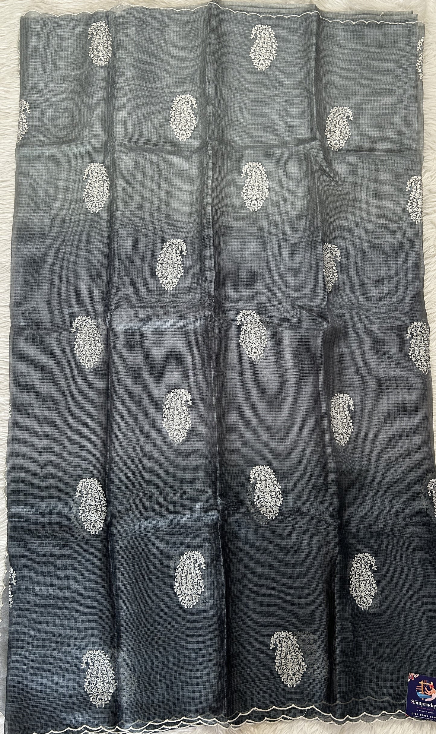 Tussar Silk Saree Gray colored complemented with a borderless Saree. - Sampradaya Designer Studio