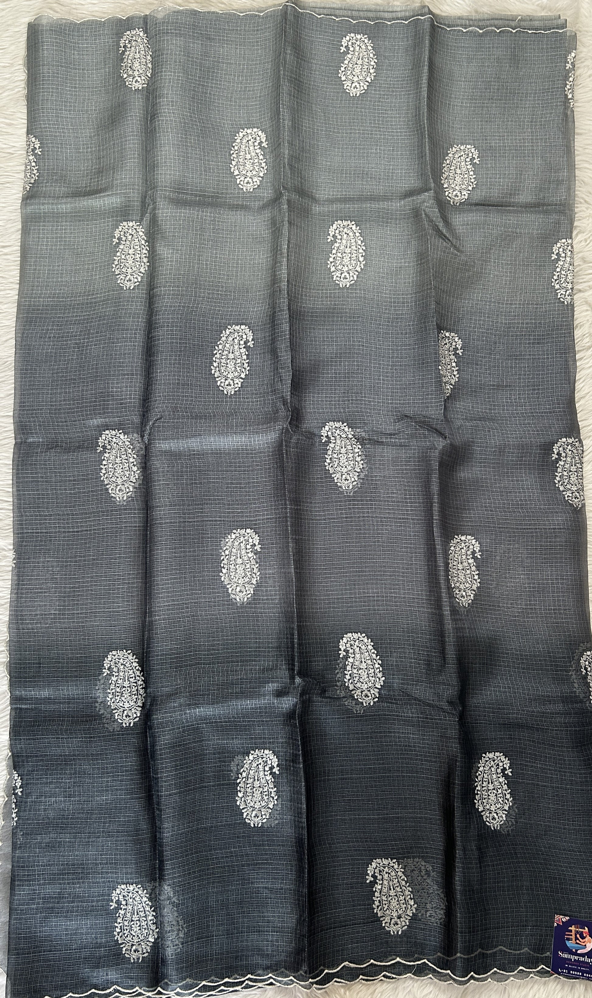 Tussar Silk Saree Gray colored complemented with a borderless Saree. - Sampradaya Designer Studio