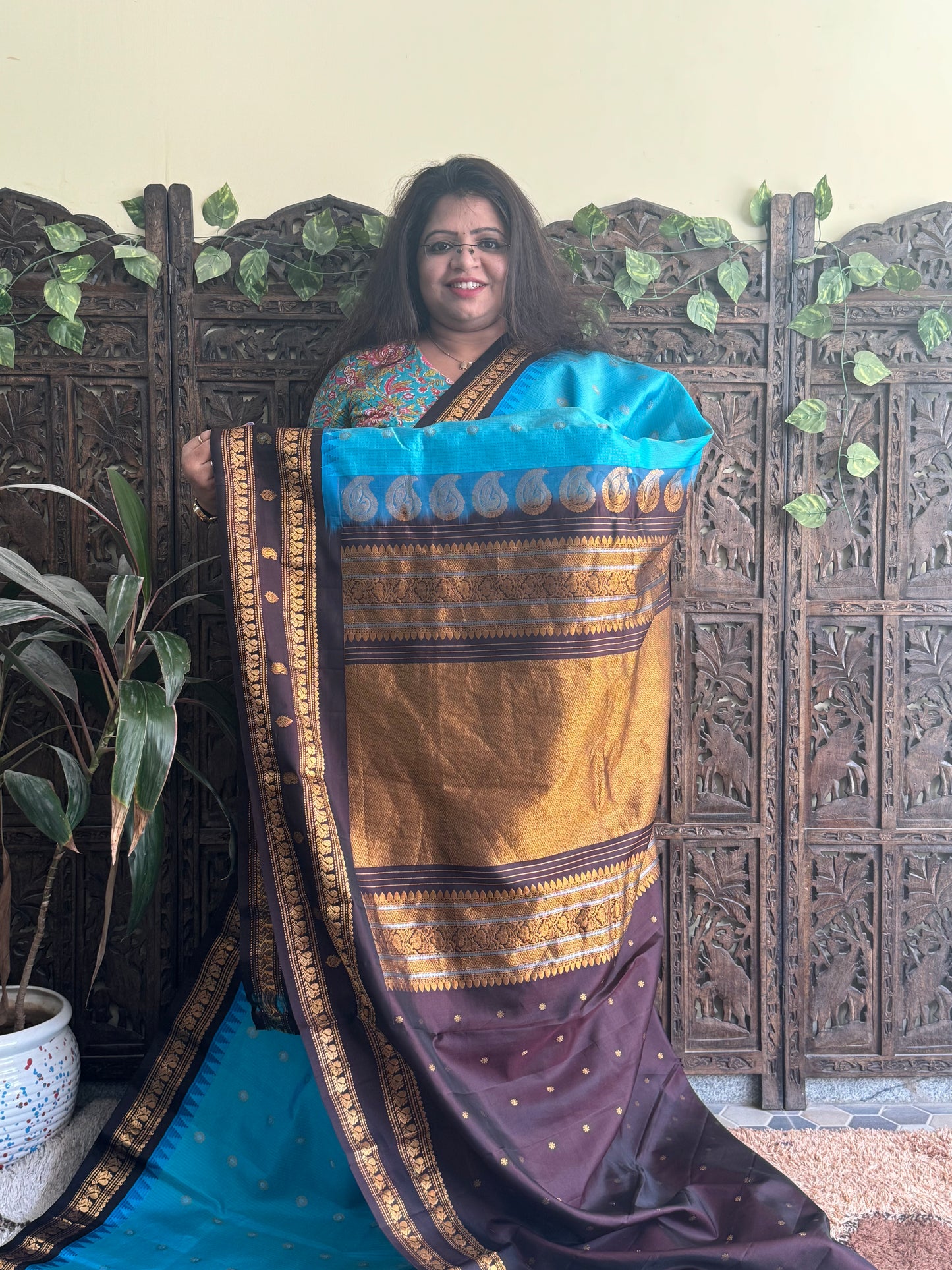 Gadwal Pattu Saree Sky Blue colored saree complemented with a Brown Zari border - Sampradaya Designer Studio