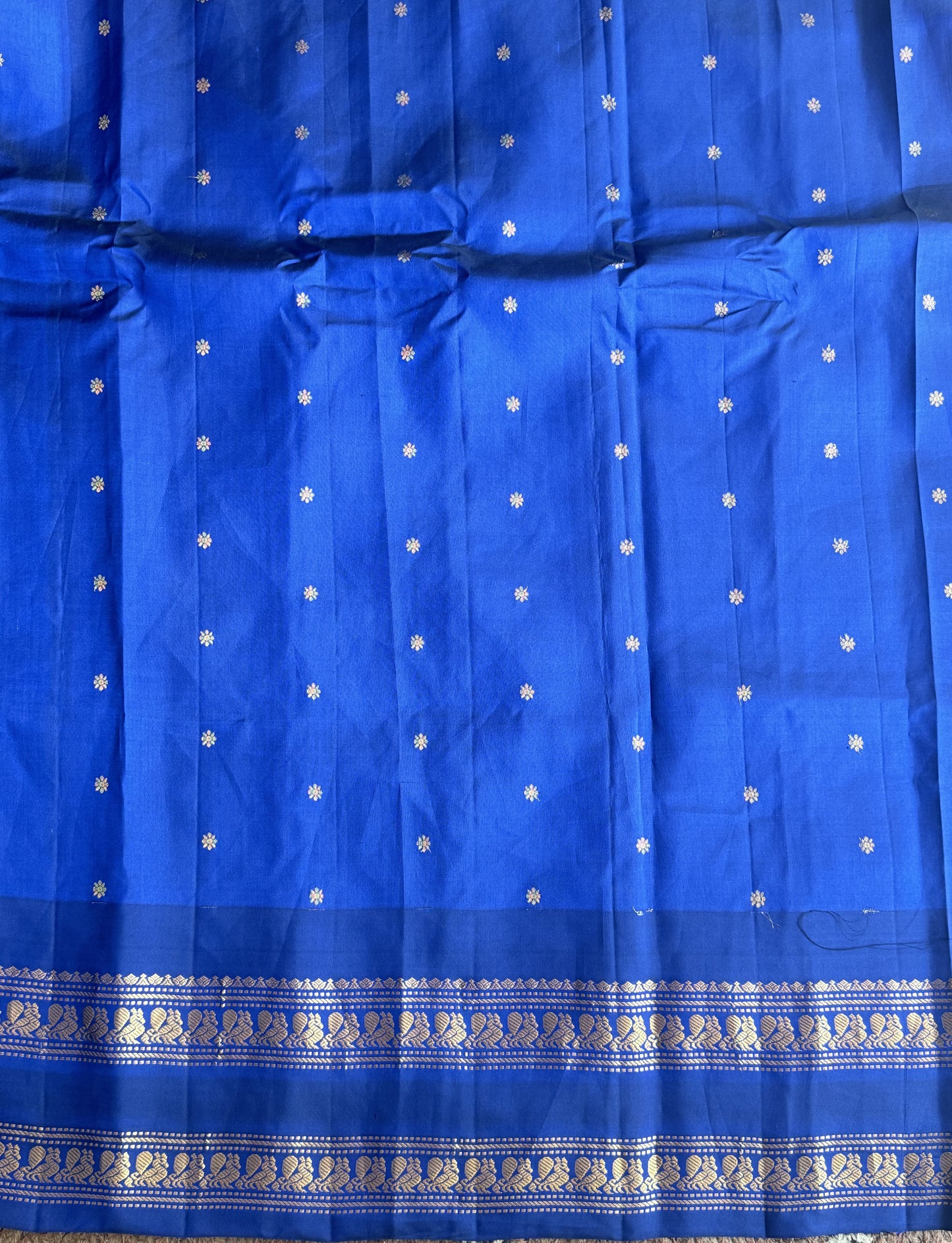Gadwal Pattu Saree Dark Peach colored saree complemented with a Ink Blue Zari border - Sampradaya Designer Studio