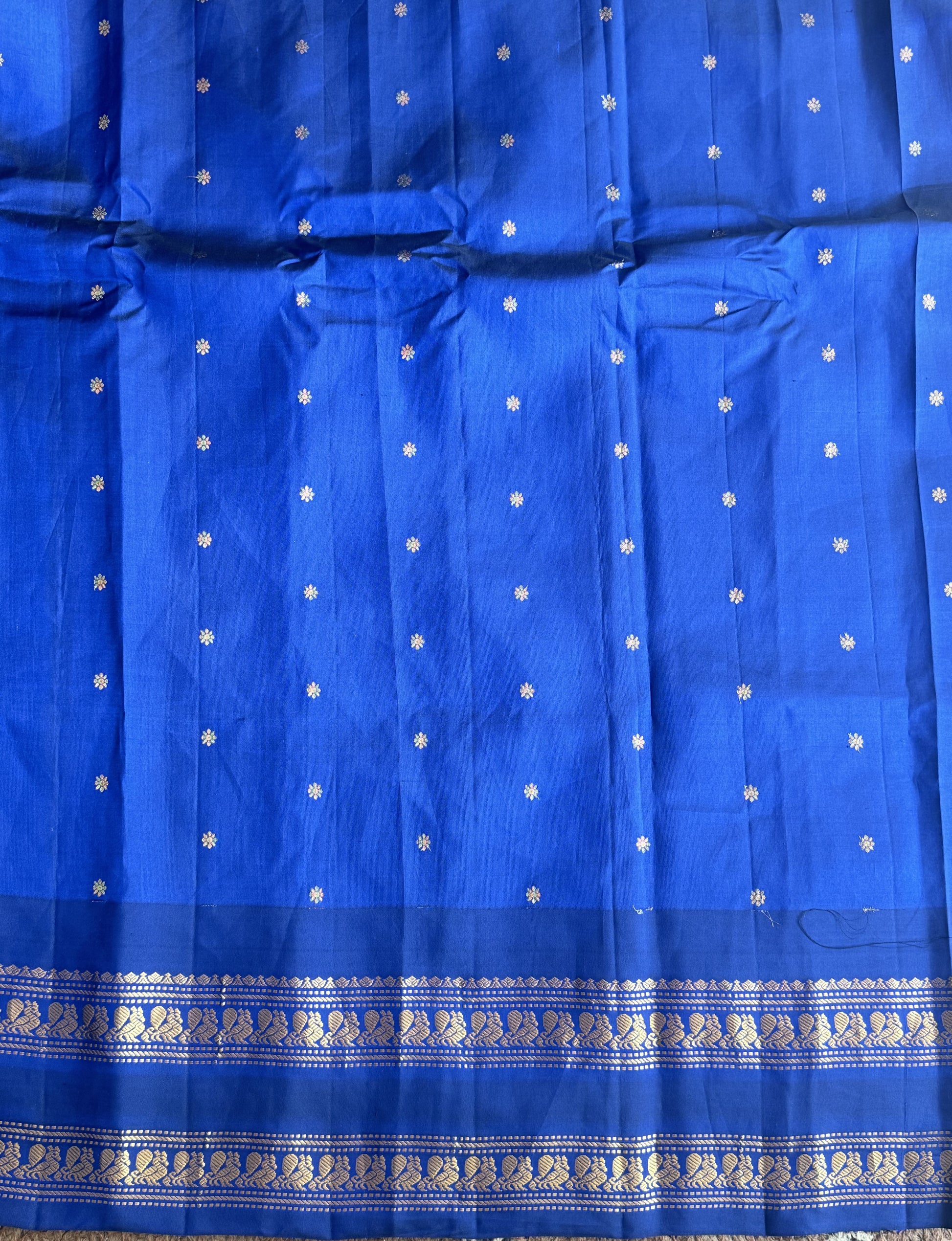 Gadwal Pattu Saree Dark Peach colored saree complemented with a Ink Blue Zari border - Sampradaya Designer Studio