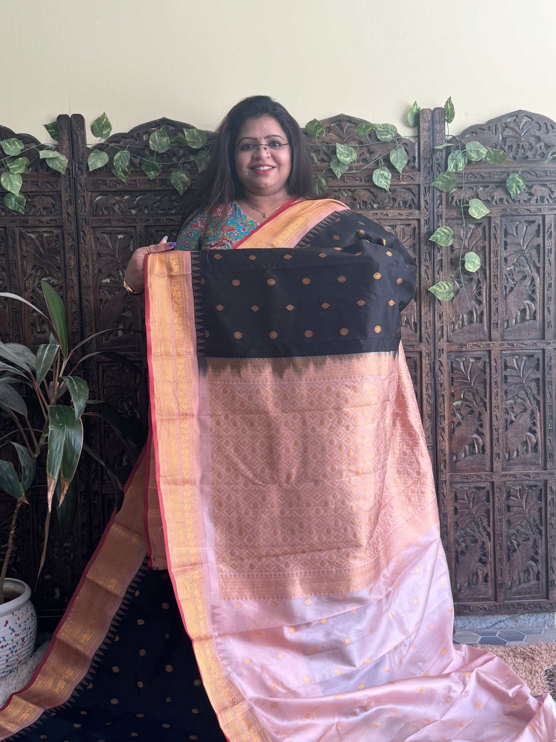 Gadwal Pattu Saree Black colored saree complemented with a Peach Zari border - Sampradaya Designer Studio