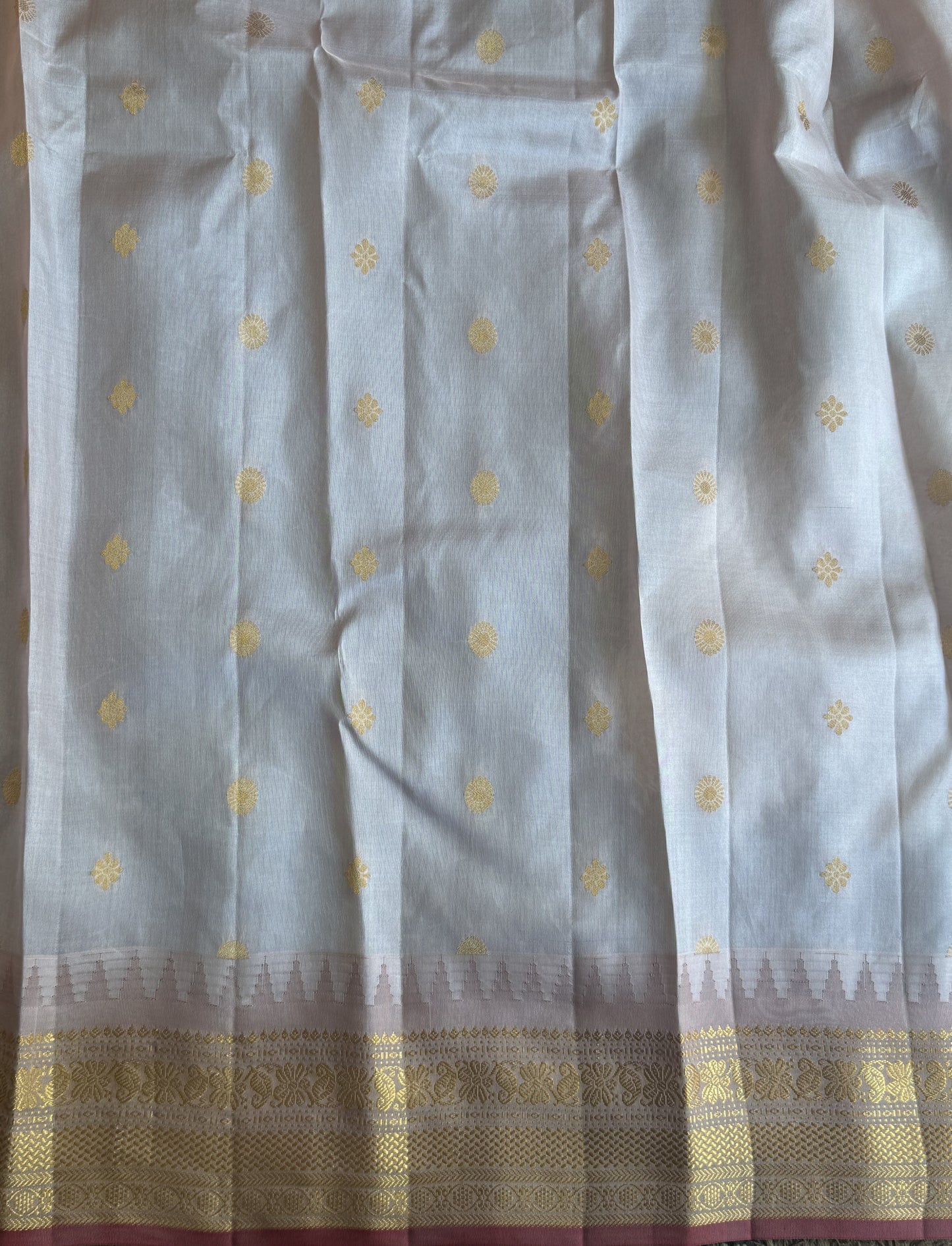 Gadwal Pattu Saree Black colored saree complemented with a Peach Zari border - Sampradaya Designer Studio
