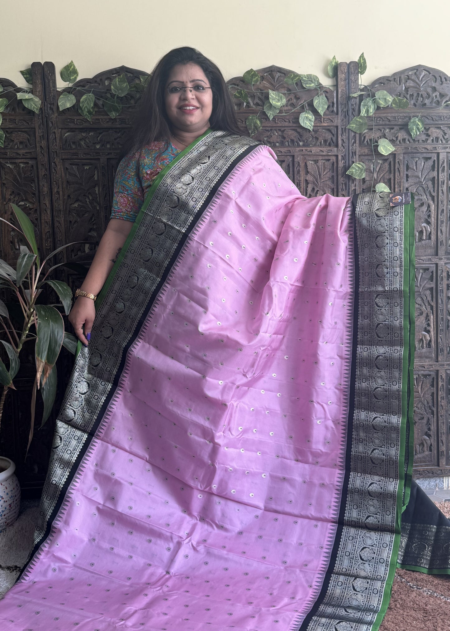 Gadwal Pattu Saree Baby Pink colored saree complemented with a Black Zari border - Sampradaya Designer Studio