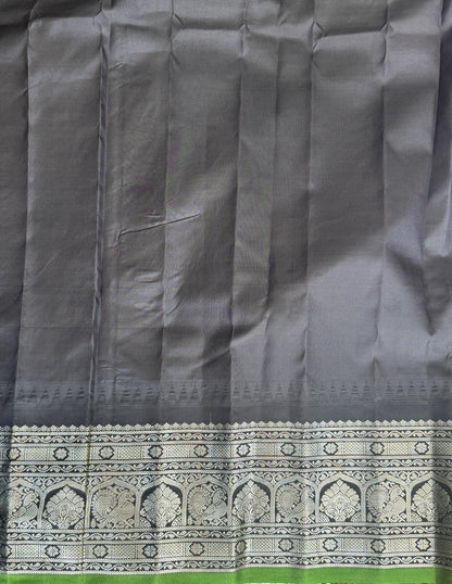Gadwal Pattu Saree Baby Pink colored saree complemented with a Black Zari border - Sampradaya Designer Studio