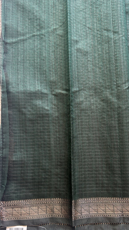 Semi Tussar Saree Colored Dark Green Complemented with a Zari Border. - Sampradaya Designer Studio