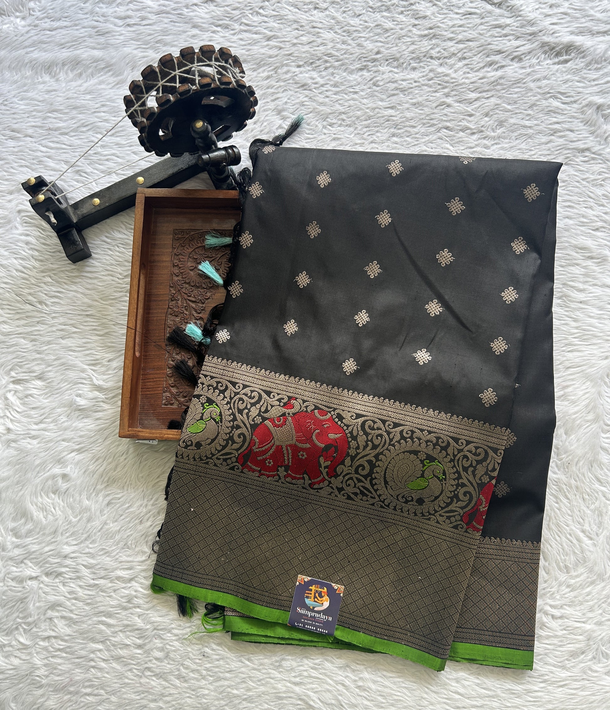 Gadwal Pattu Saree Black Colored Complemented With a Zari Border - Sampradaya Designer Studio