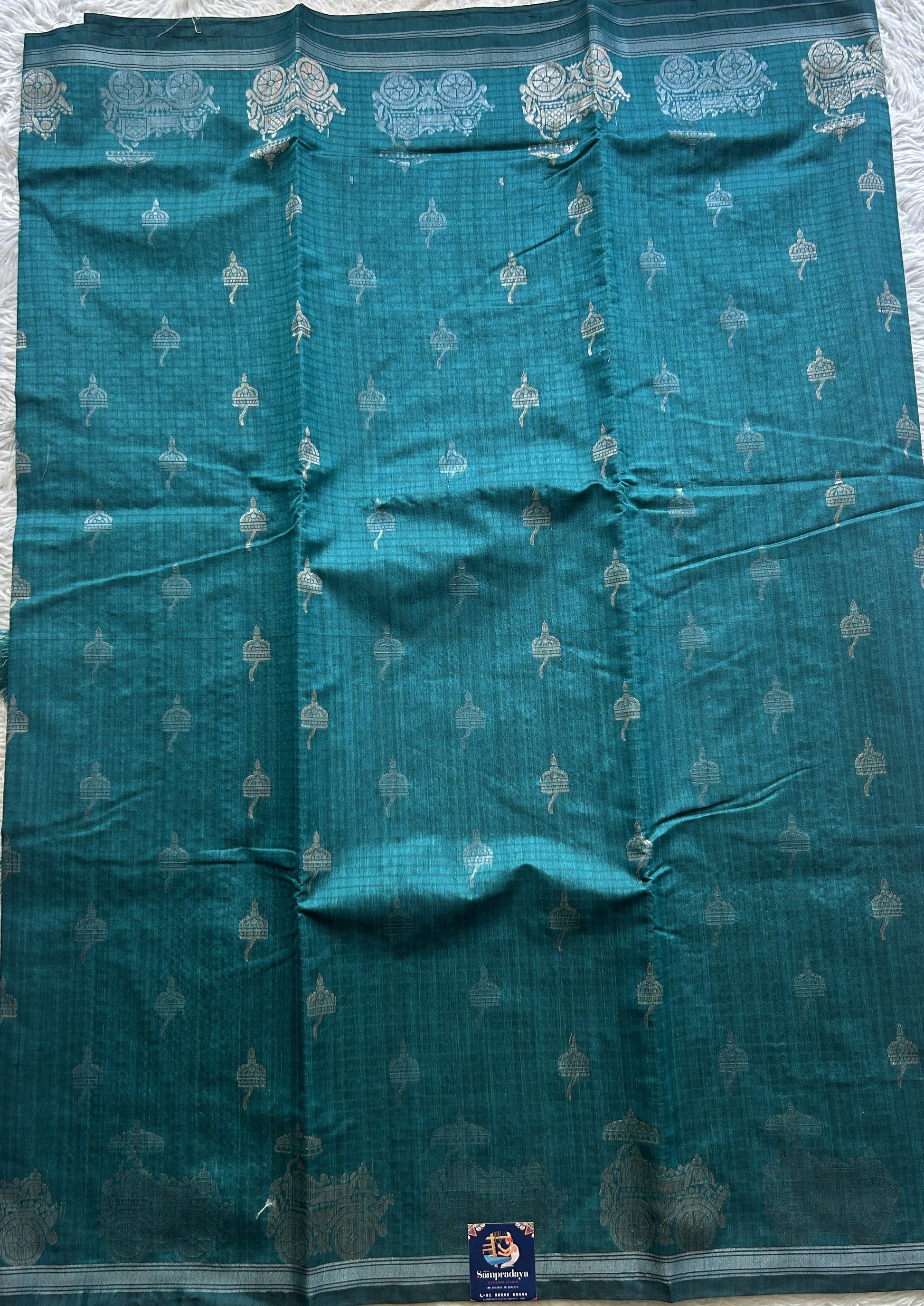 Semi Tussar Saree Colored Rama Green Complemented with a Zari Border. - Sampradaya Designer Studio