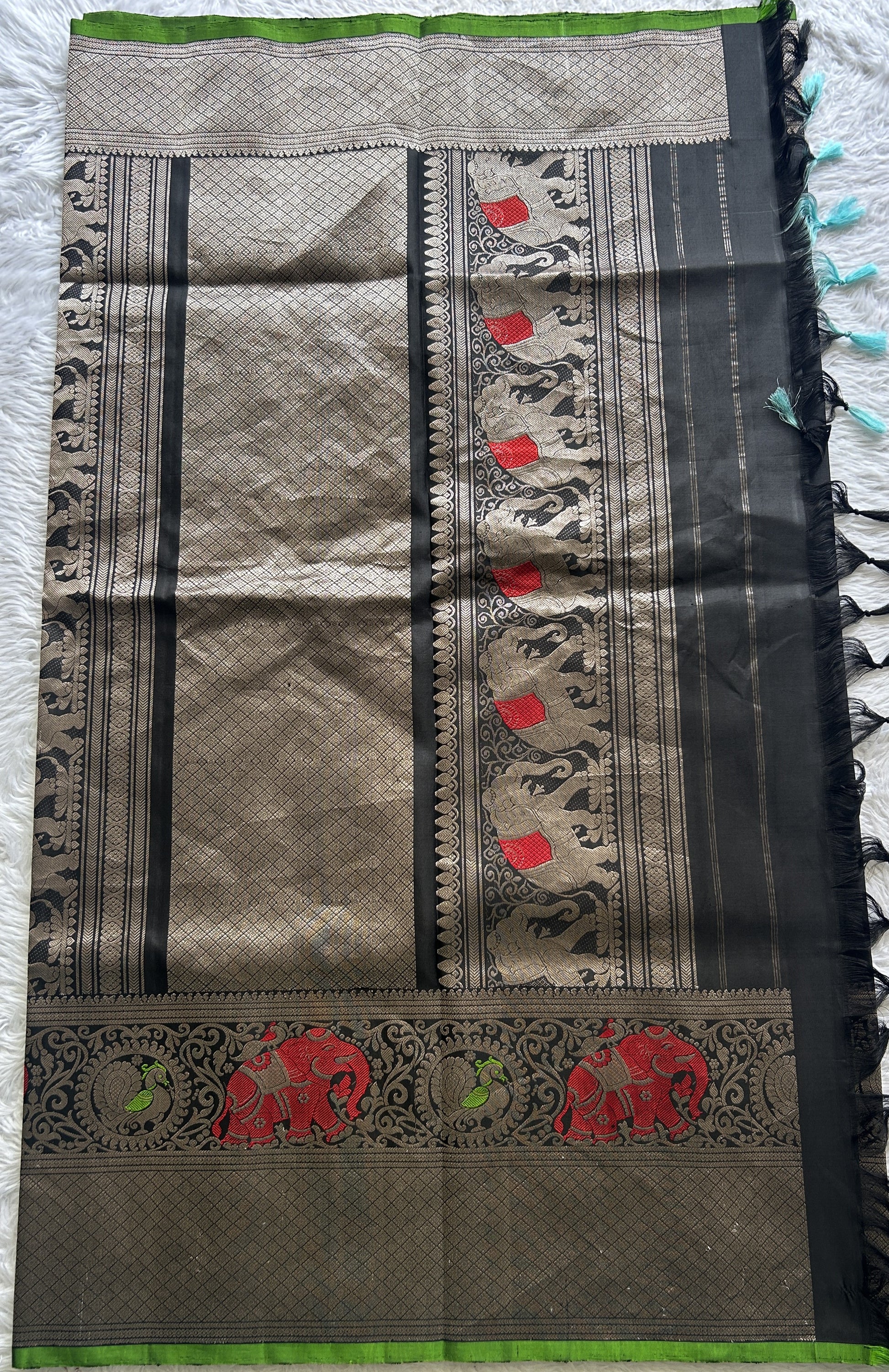 Gadwal Pattu Saree Black Colored Complemented With a Zari Border - Sampradaya Designer Studio