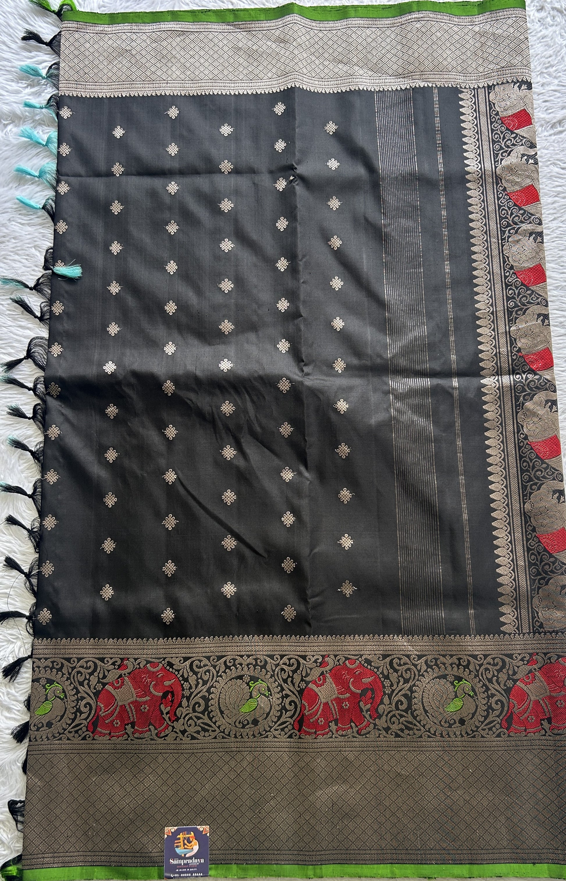 Gadwal Pattu Saree Black Colored Complemented With a Zari Border - Sampradaya Designer Studio